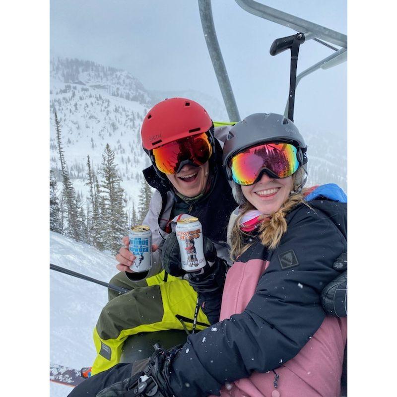 Cheersing while skiing in Jackson Hole