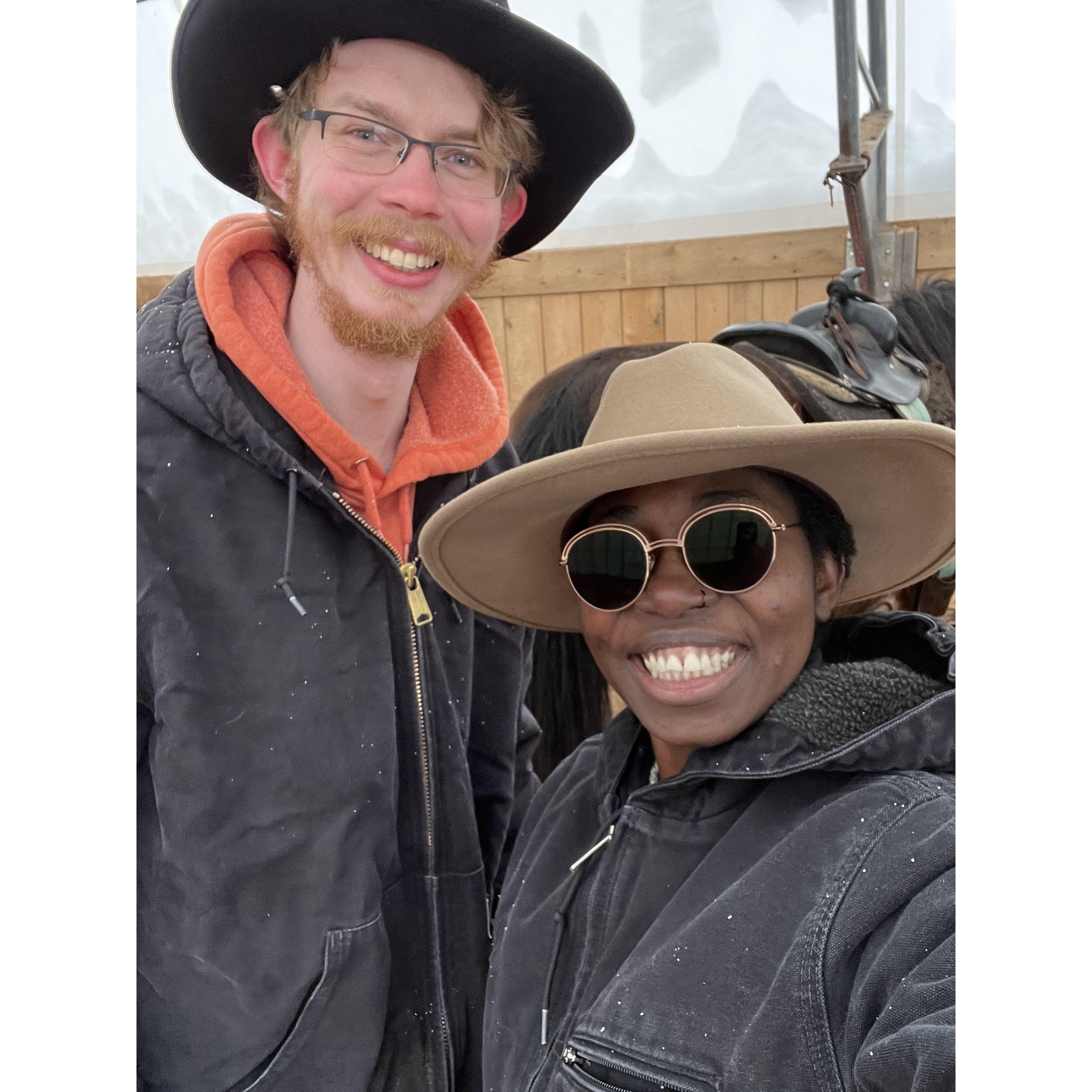 Some horse riding together