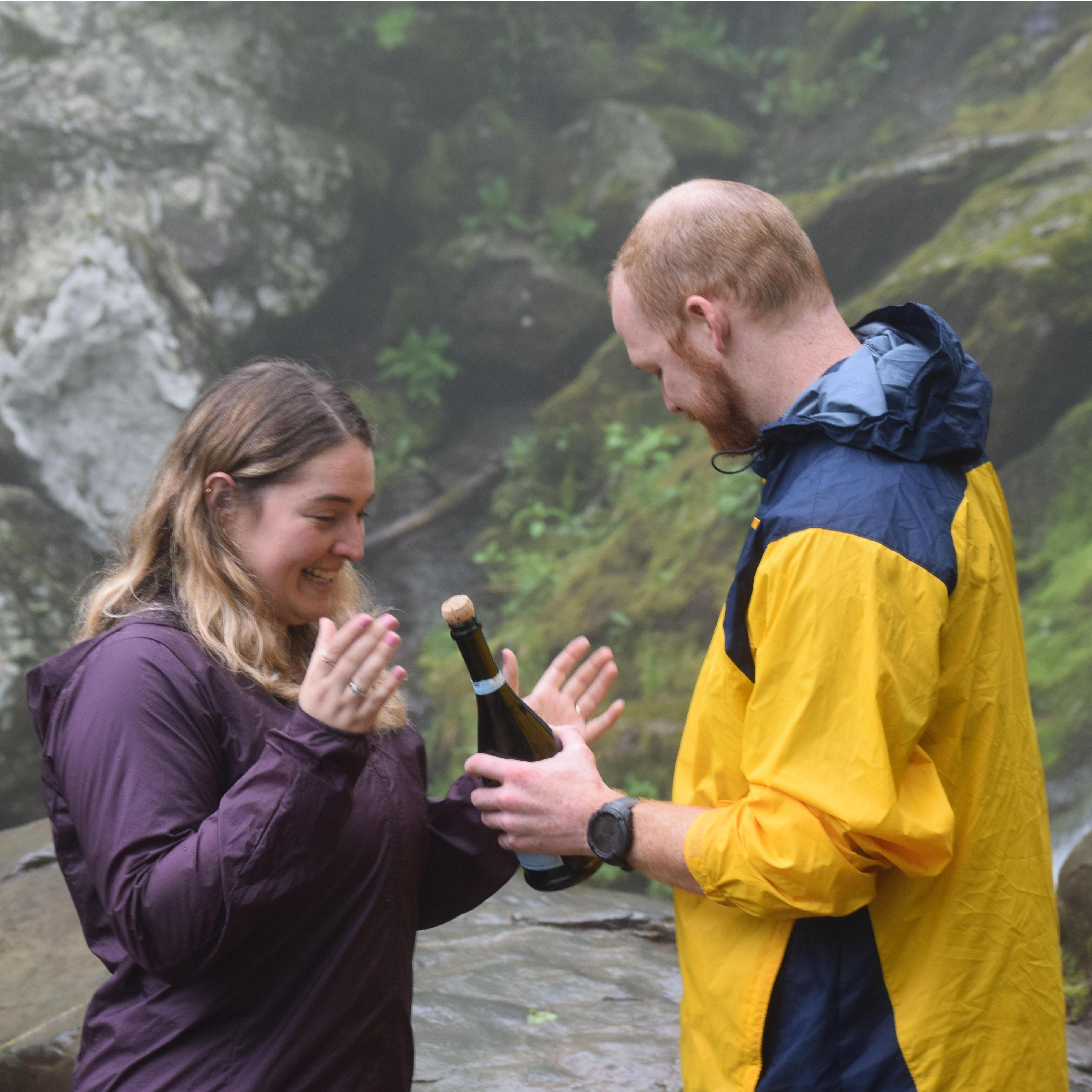 Stephen proposed by a waterfall in Shenandoah National Park, and brought Maura's best friend, Ashley, along to bring the camera and champagne!