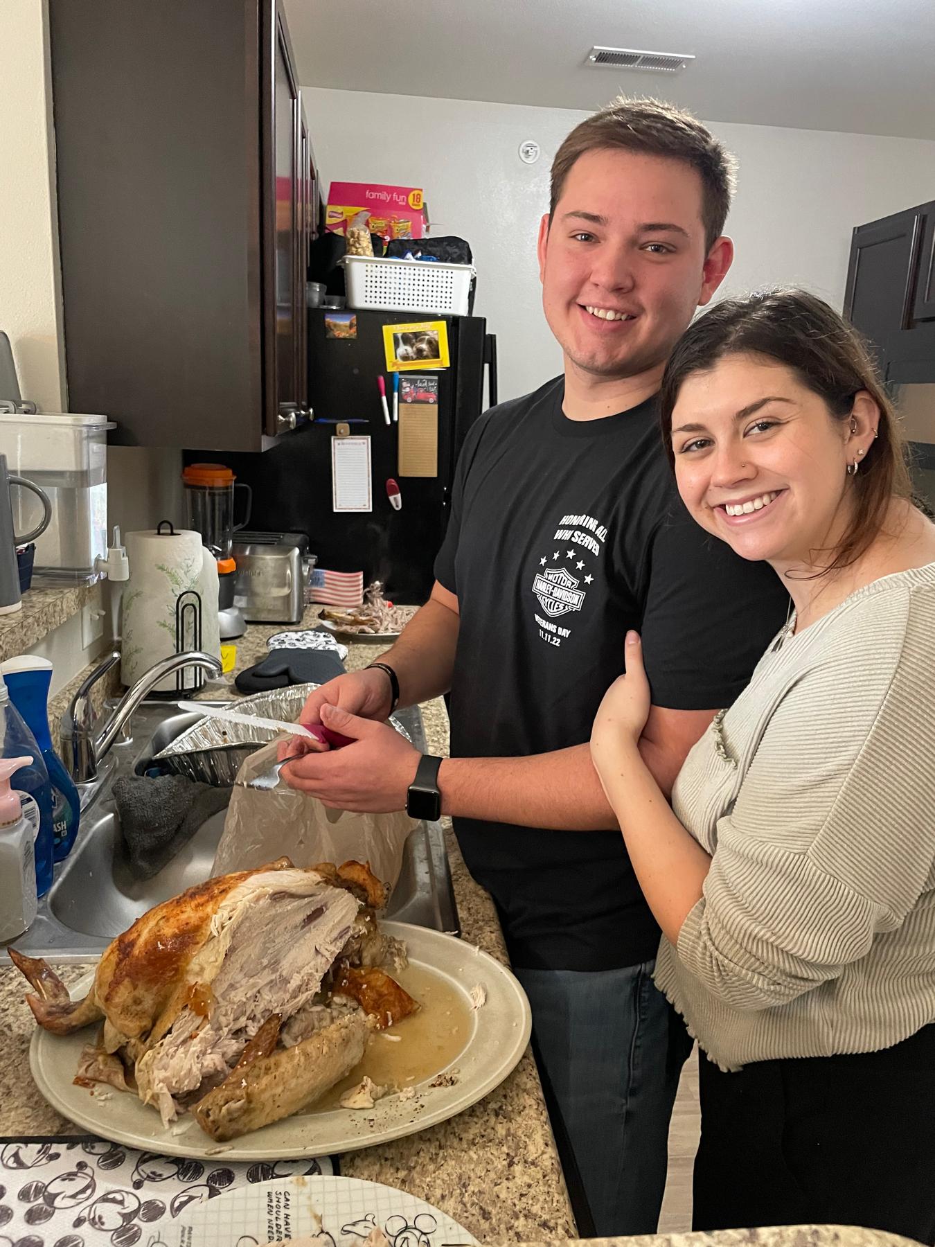 Cutting our first turkey together