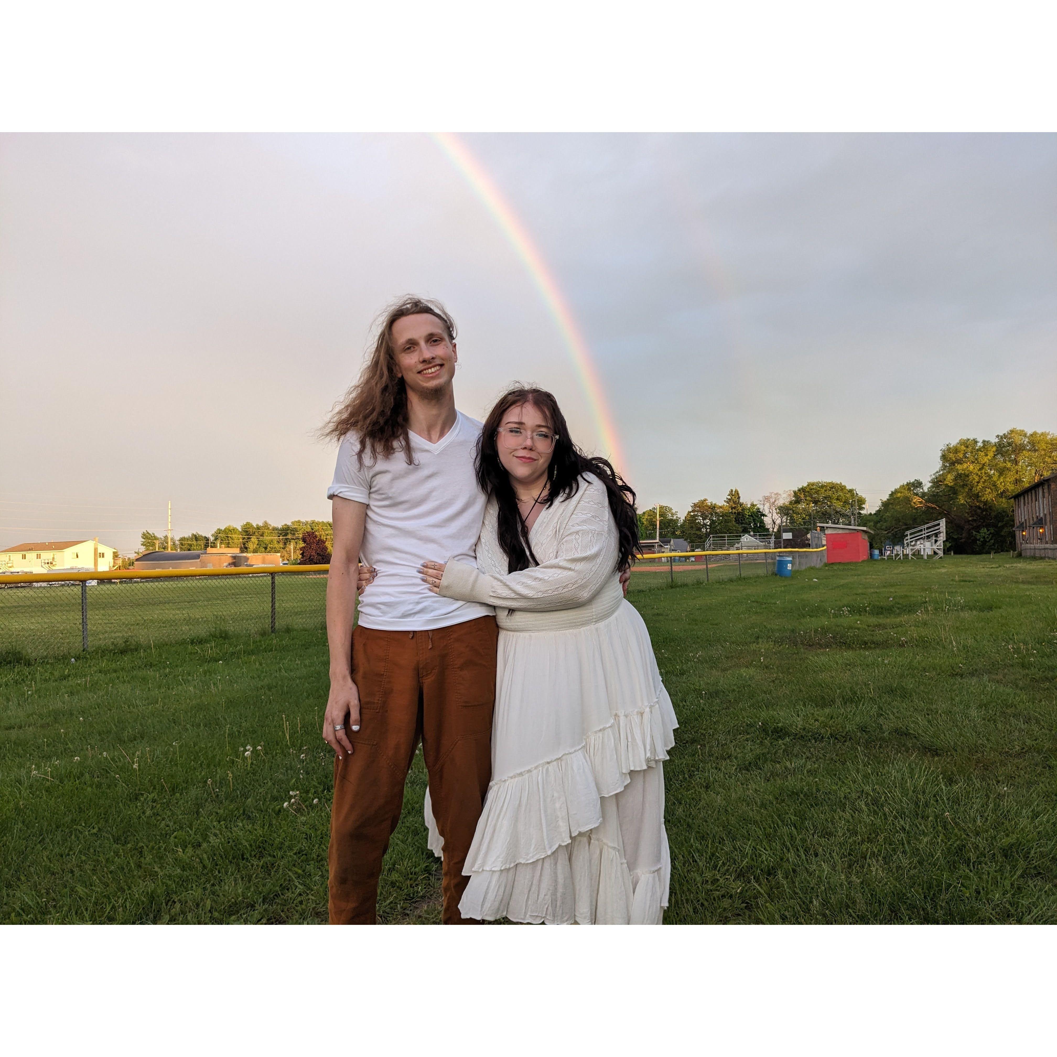 Us under our wedding double rainbow, later in the day.