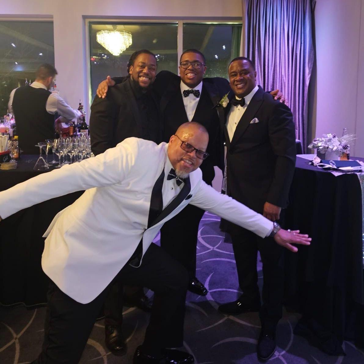 The Groom clowning with the fellas