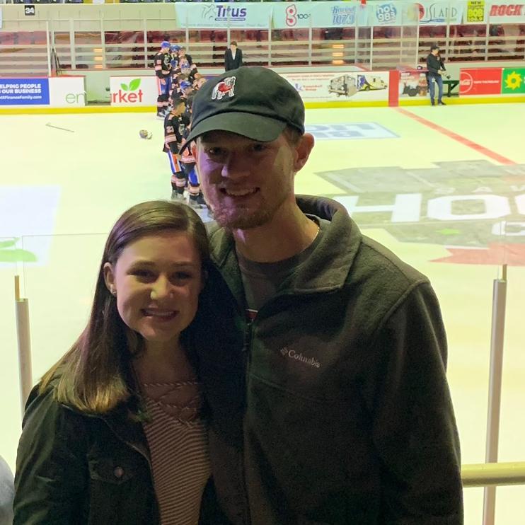 Alexis and Dlyen at a GA hockey game in 2019
