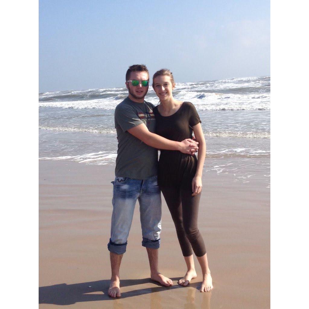 The first time Spencer saw the beach! We were in Galveston, TX around Christmas time. 