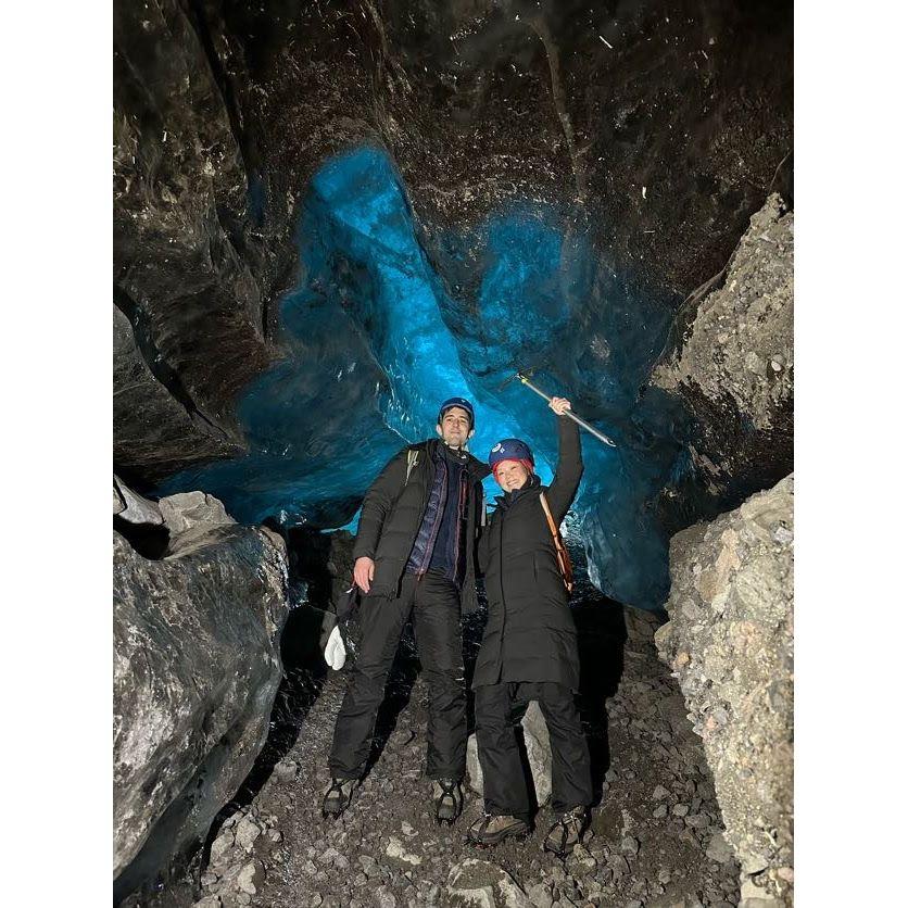 Nick and Ping conquering an ice cave and being conquered by frostbite in Iceland in 2024.
