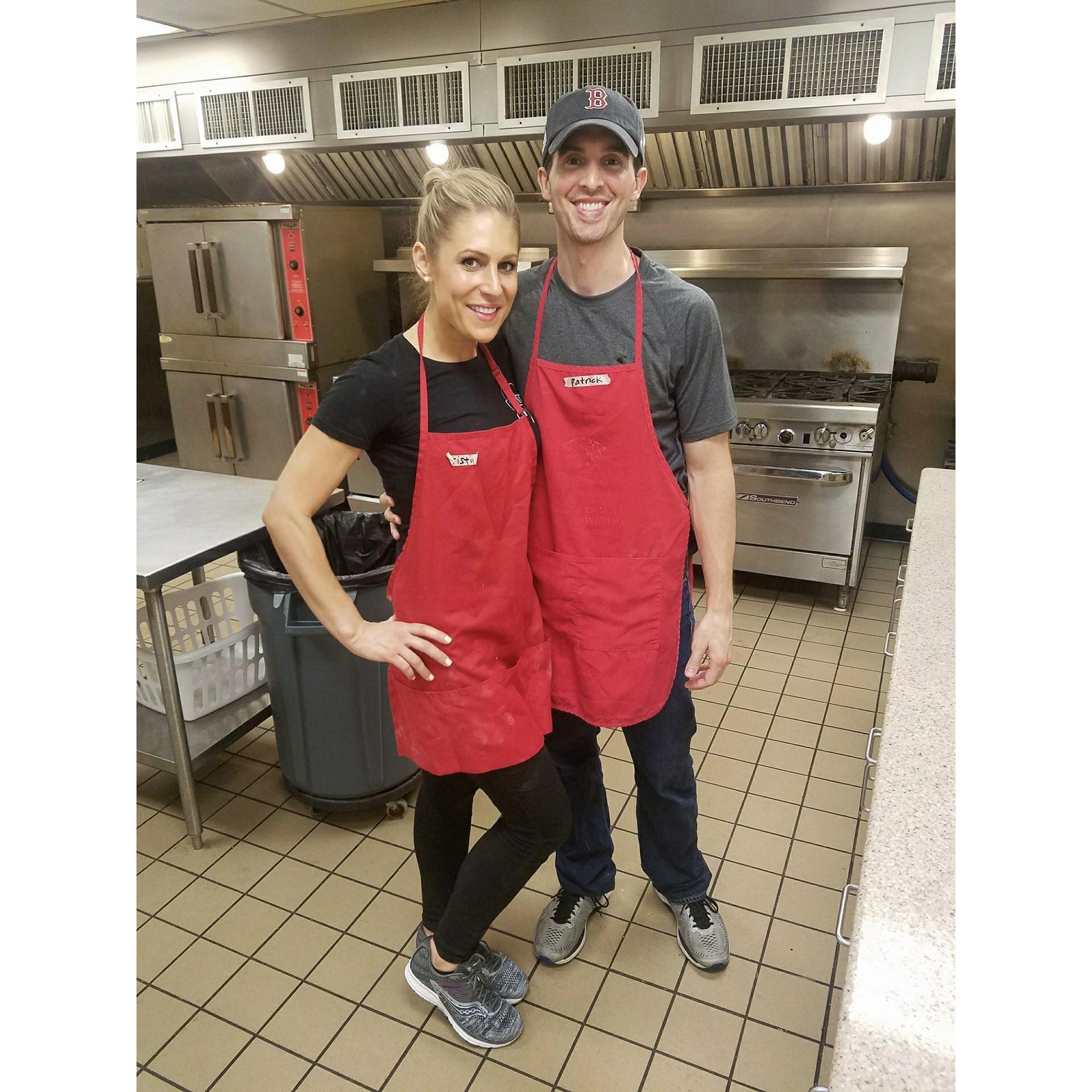 Serving together in one of the local community kitchens to help the poor