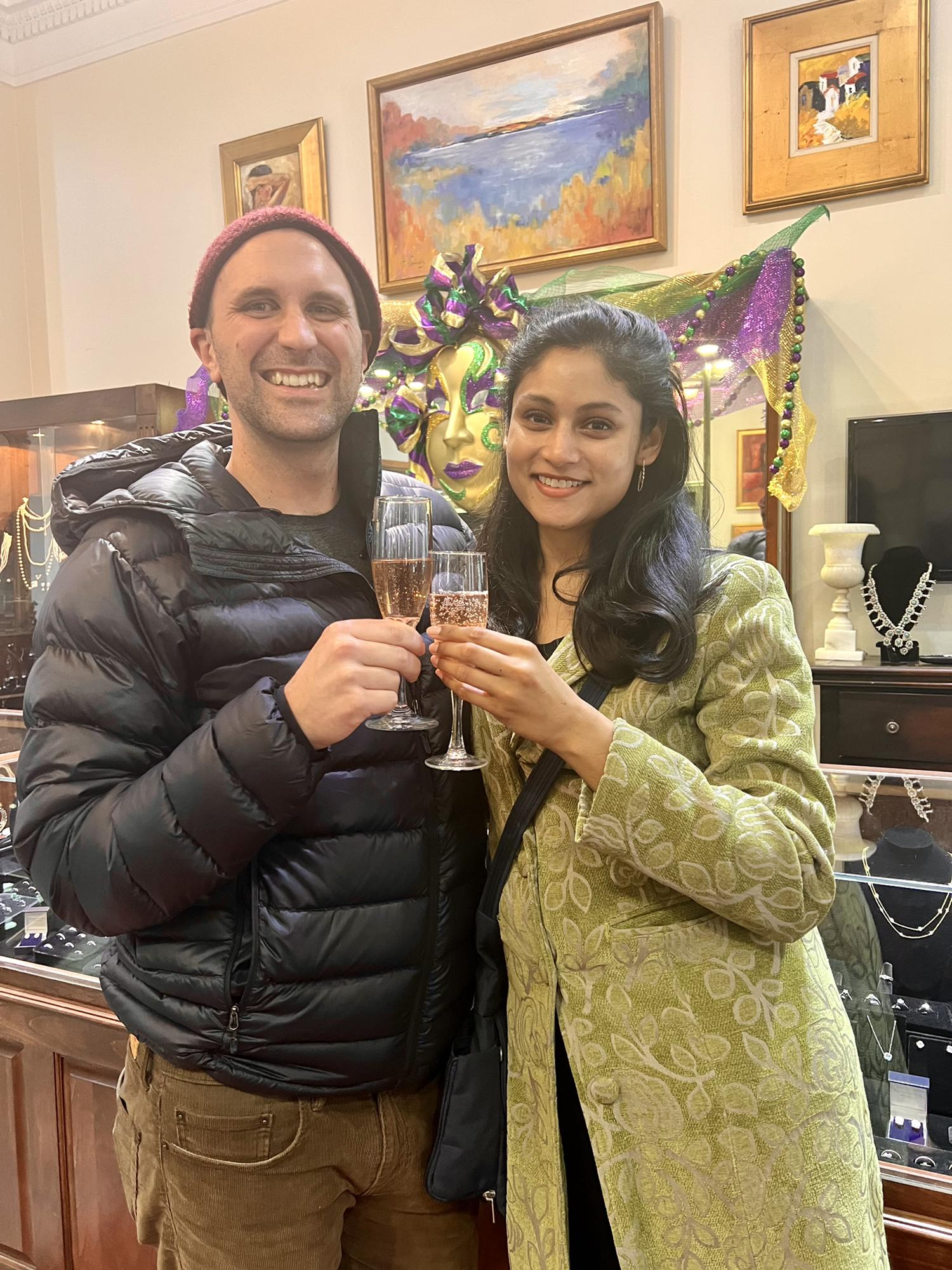 Daniel and Chandini designed an engagement ring together at a local jewelry store in the French Quarter. Here they are toasting after the ring was purchased!