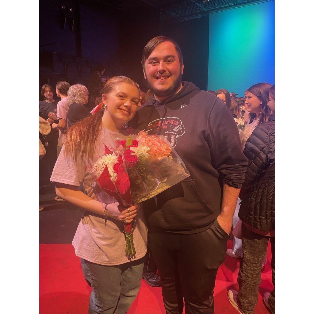 Nick at a show Emily directed in Winter 2023, once again always with flowers in hand!