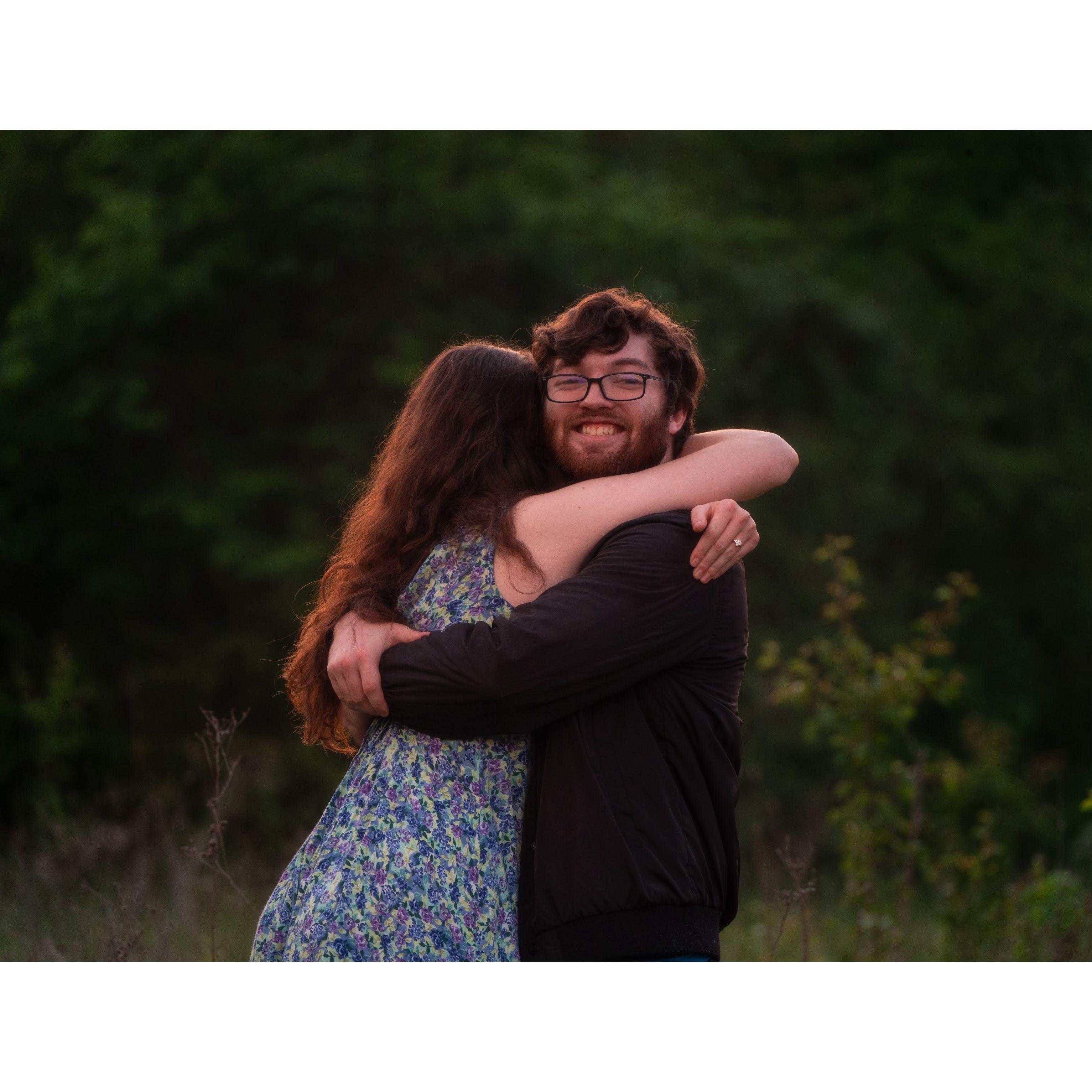 A snapshot of the hug we shared at the end of a slow dance, and moments before proposing!
