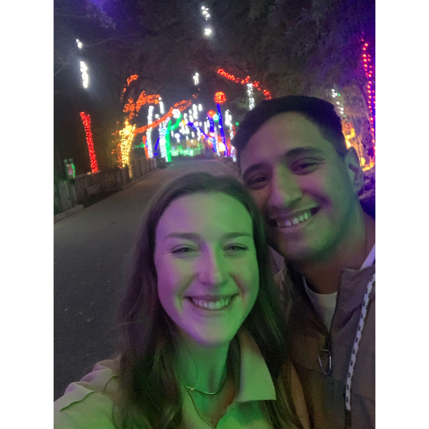 Johnny surprised Morgan with a night at the Dallas Zoo to look at their Christmas lights in 2022 - their first Christmas together!
