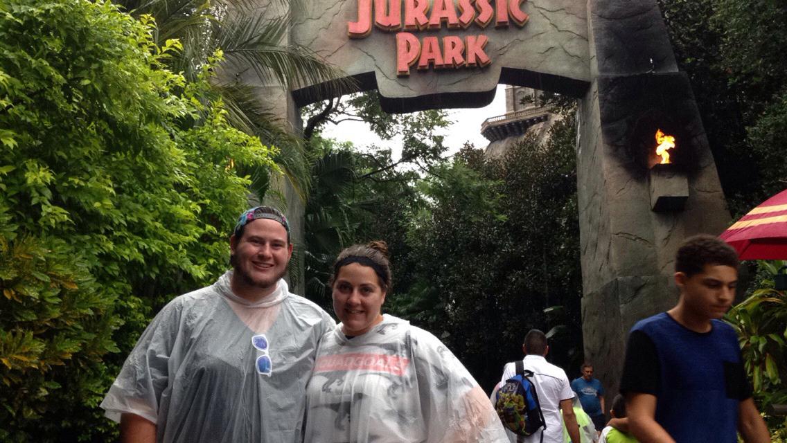 At universal studios in the rain being cool people wearing ponchos