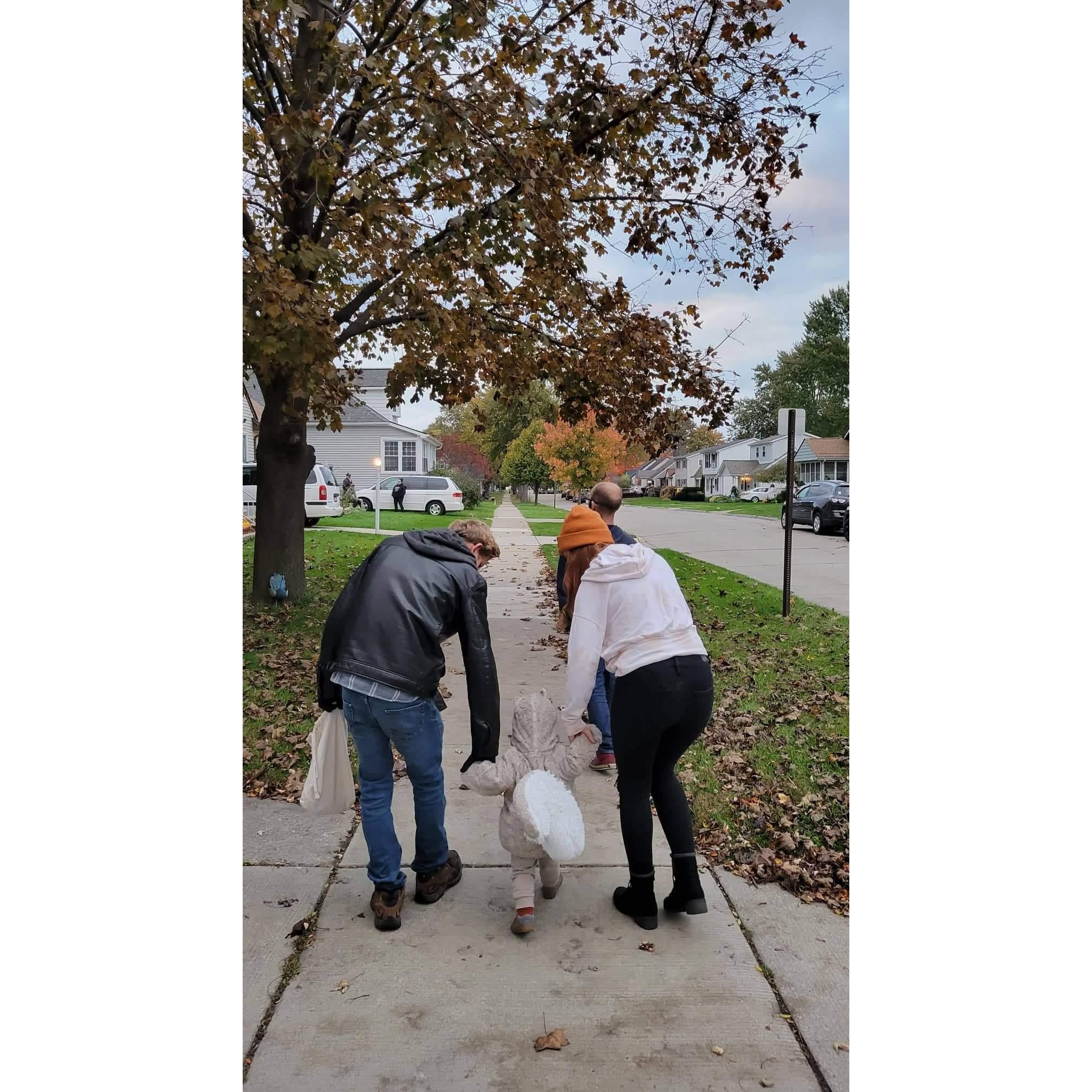 David and I taking Elijah trick or treating for the first time.