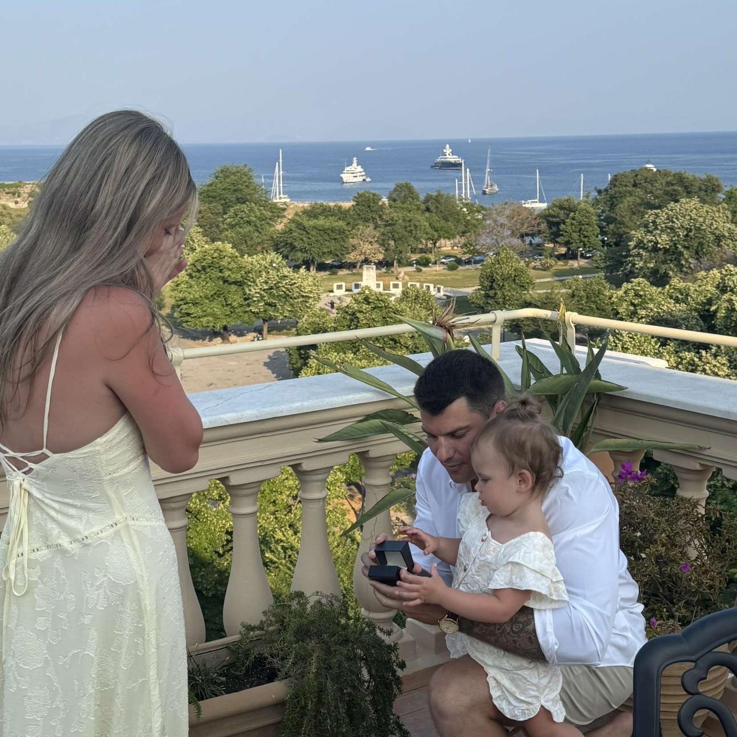 Matt proposed to me on a rooftop restaurant, the Arcadia, in Corfu, Greece. I was totally shocked and had no idea!