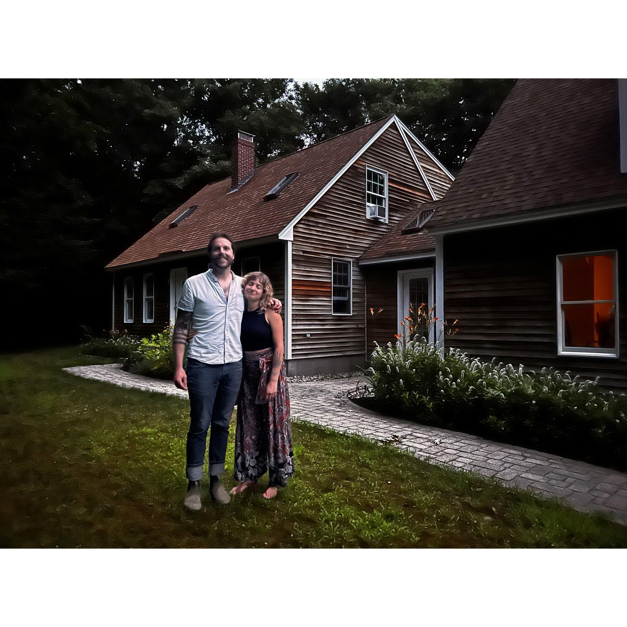 Our first photo together after buying our house! it's not really a good photo! but it's fun!