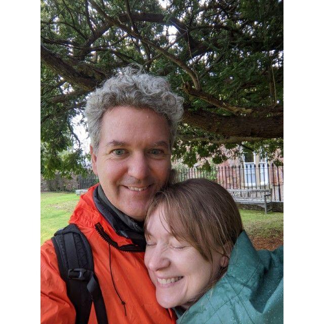 Moments after the proposal under an ancient yew tree at Melrose Abbey, Scotland. Note how the ring really matches Victoria's raincoat.
