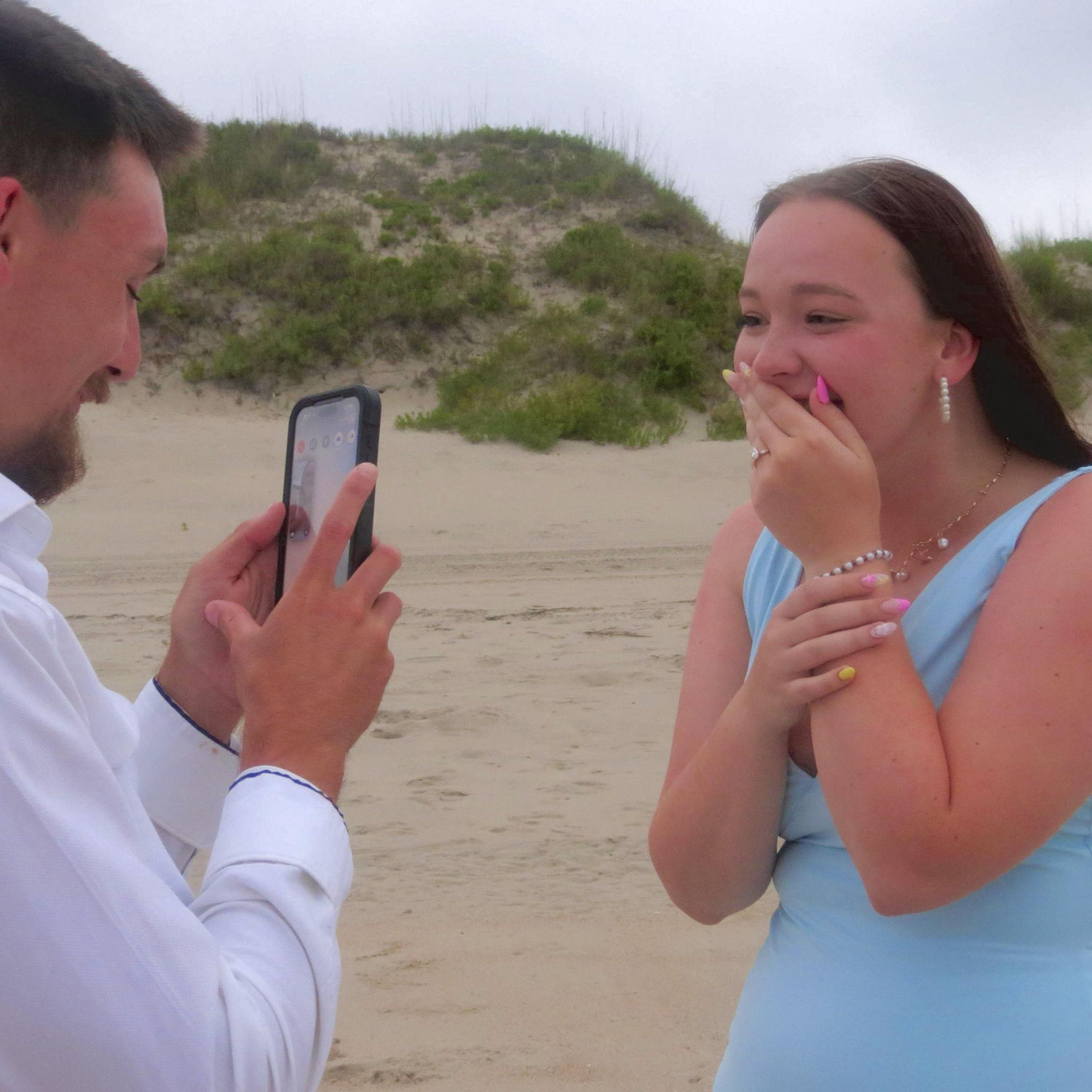 Cody showing our families my beautiful ring!