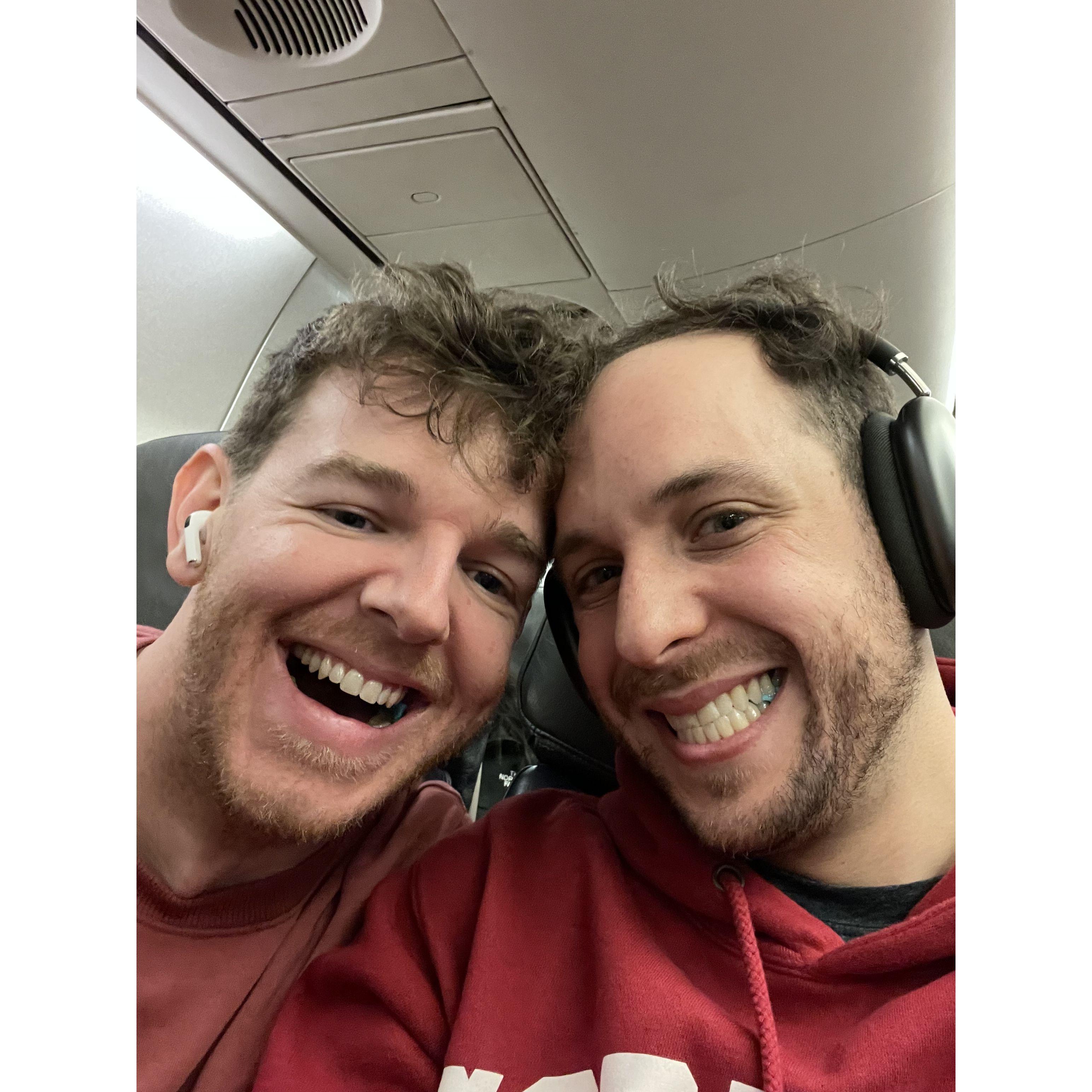 November 2023 - On a plane - Headed to another wedding, look how happy we are.