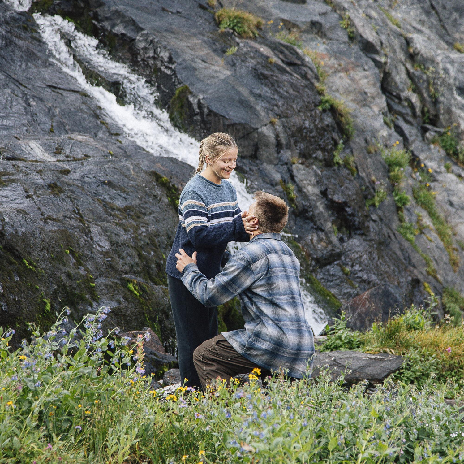 Just after sunrise, Chase suggested we "go get more firewood..." (crazy really since we were leaving to hike back soon). He popped the question in front of a beautiful waterfall