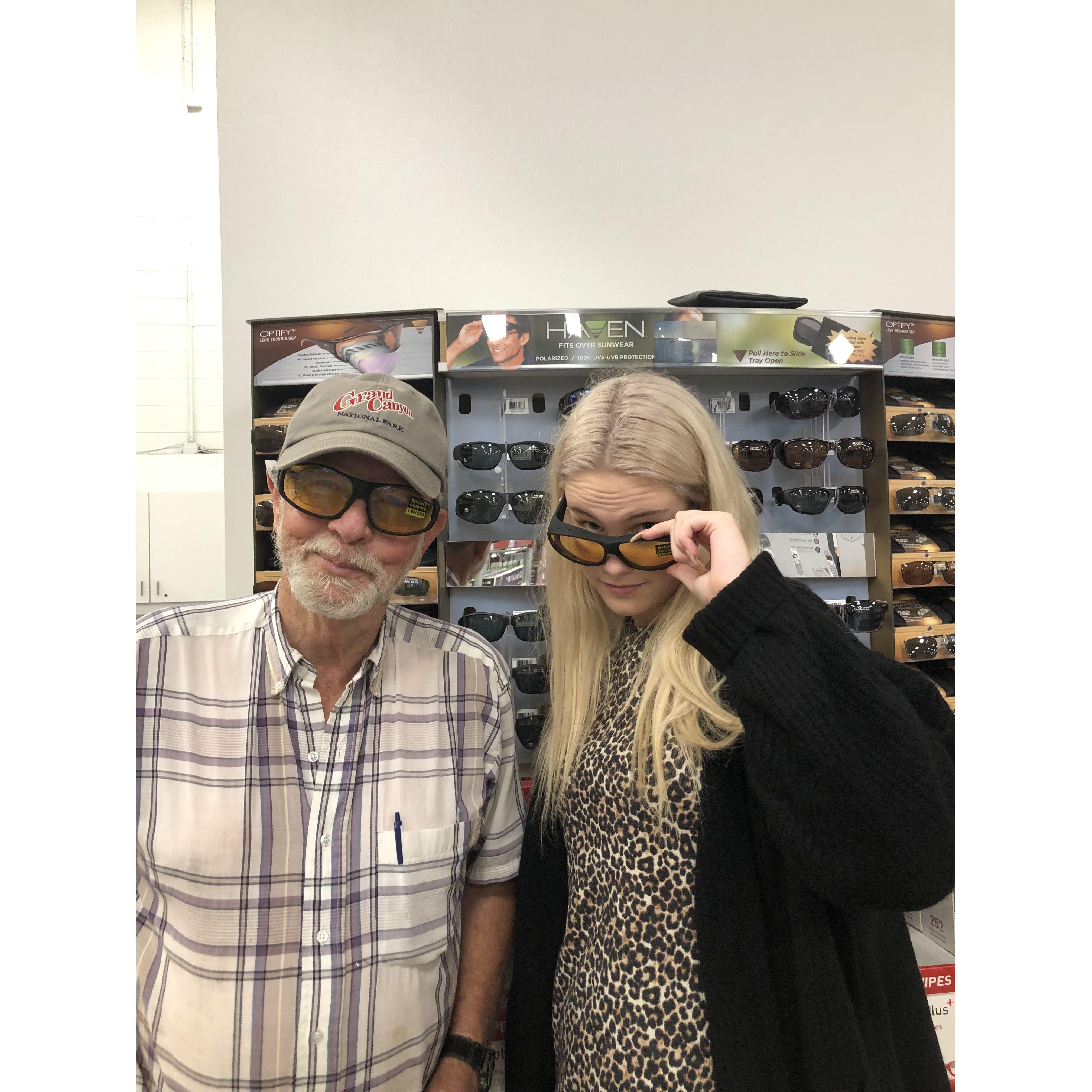 trying on glasses with paw