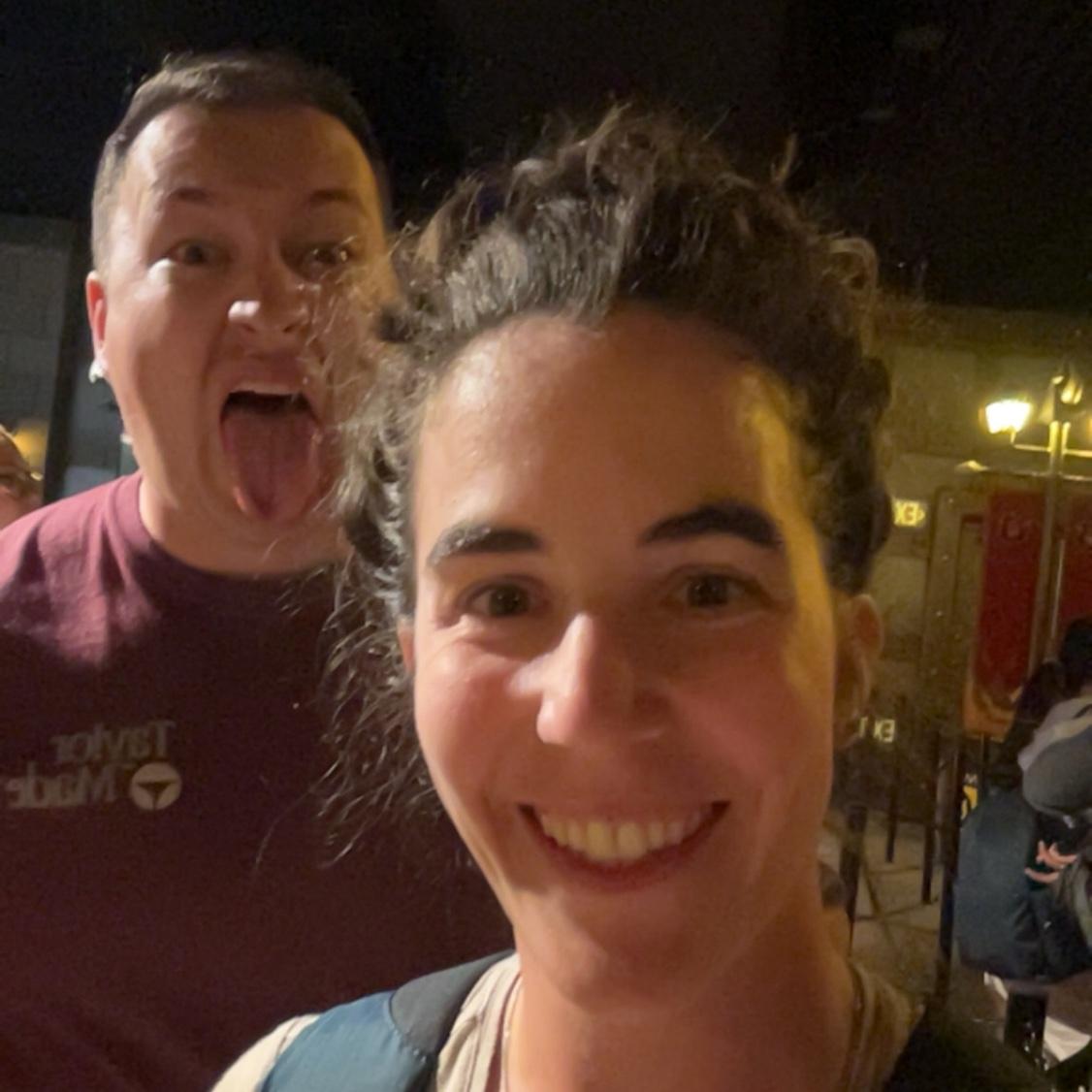 Dylan goofing off waiting in line at Epic in Orlando, October 2025