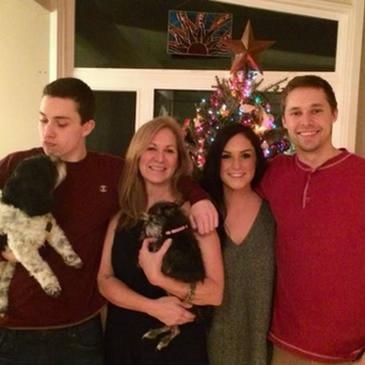 Trevor’s family Christmas card with their late family dog Snoop and Tara’s dog Daisy