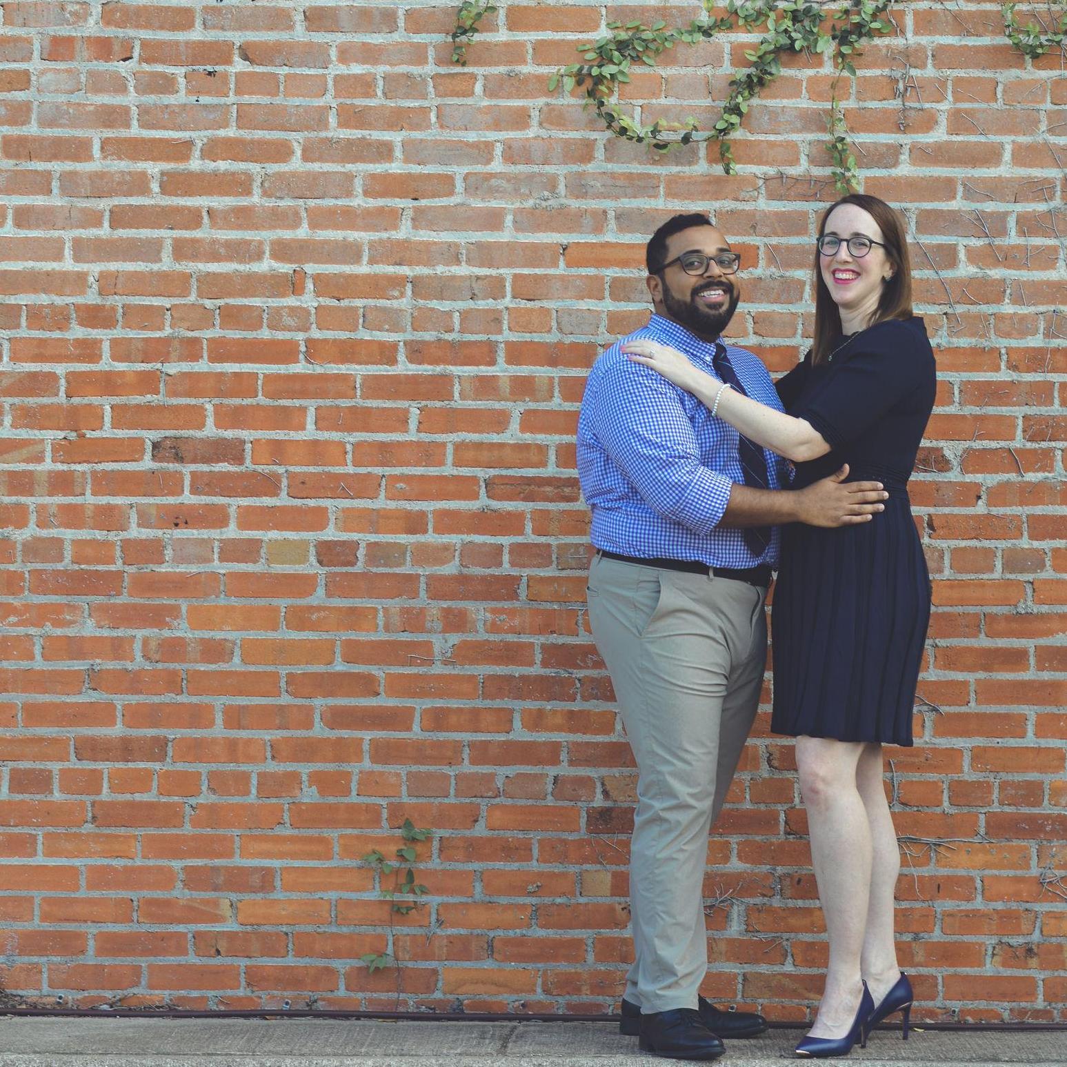 Obligatory engagement picture with a brick wall and vines.  See also: senior pictures.