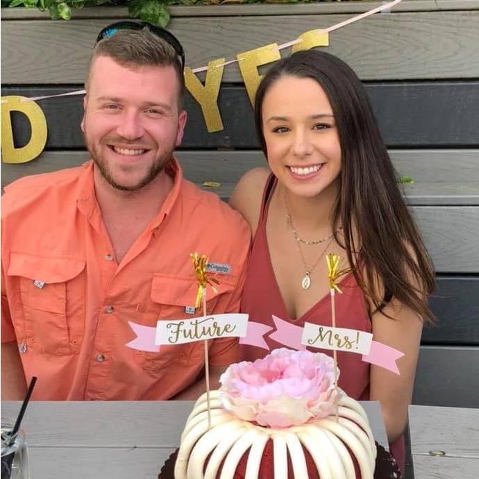 Celebrating after Cydney said YES!