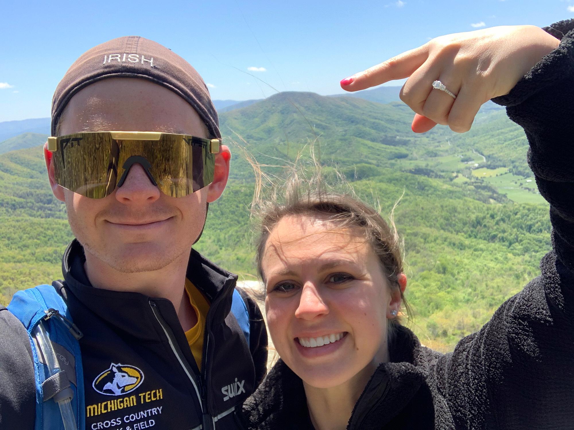 Pointing to McAfee Knob where Grant proposed during our last hike in Virginia