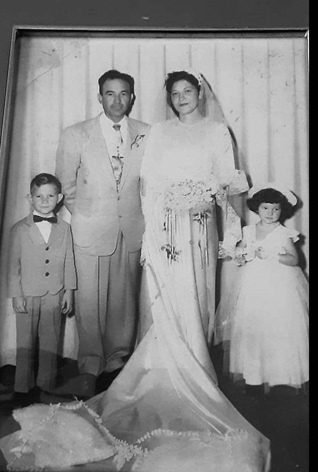 My paternal grandmother on her wedding day in 1950. Juan and Carolina Morales. I am proud to carry on this moment.