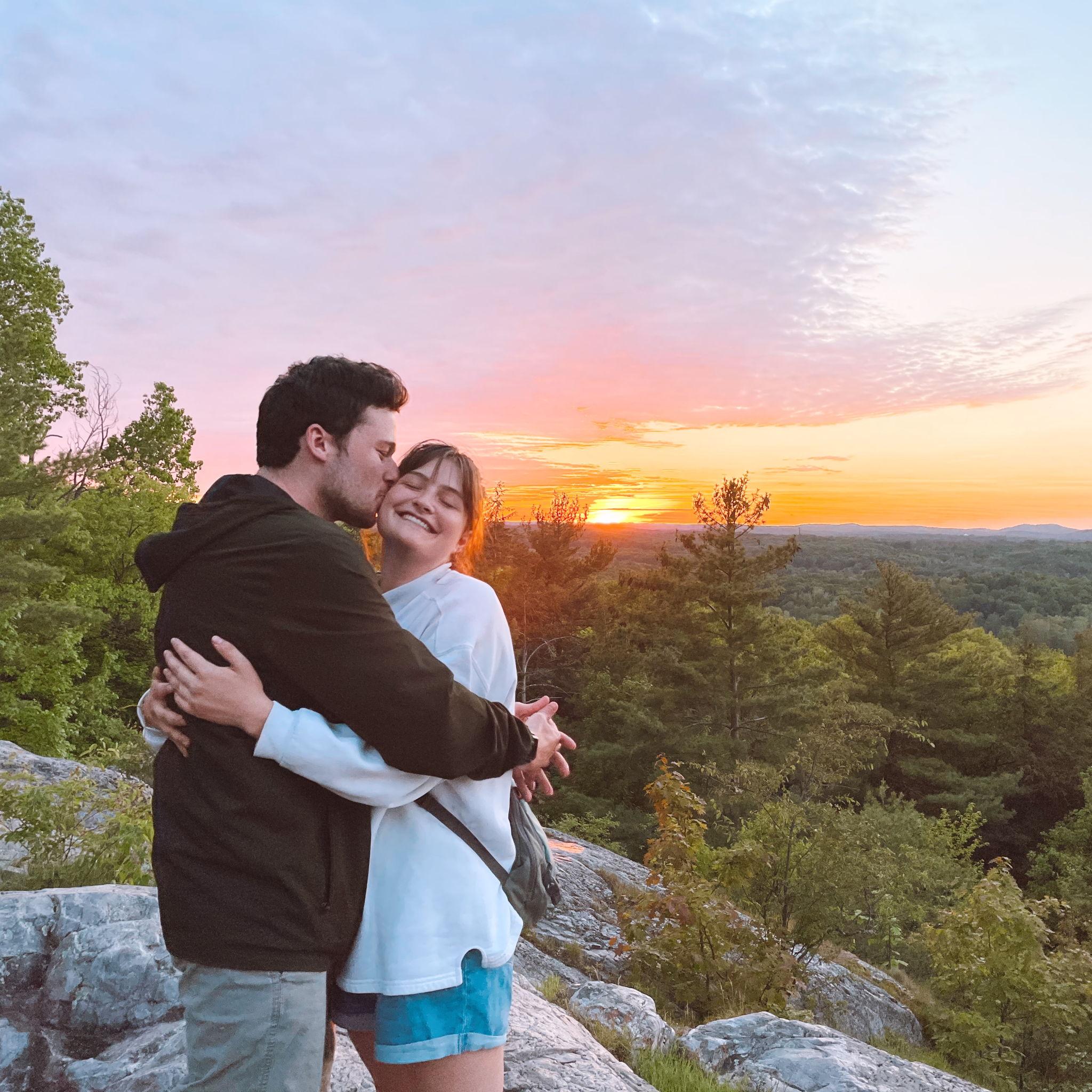 June 2021: One of many sunsets spent together, remains one our favorite pictures together to this day!
