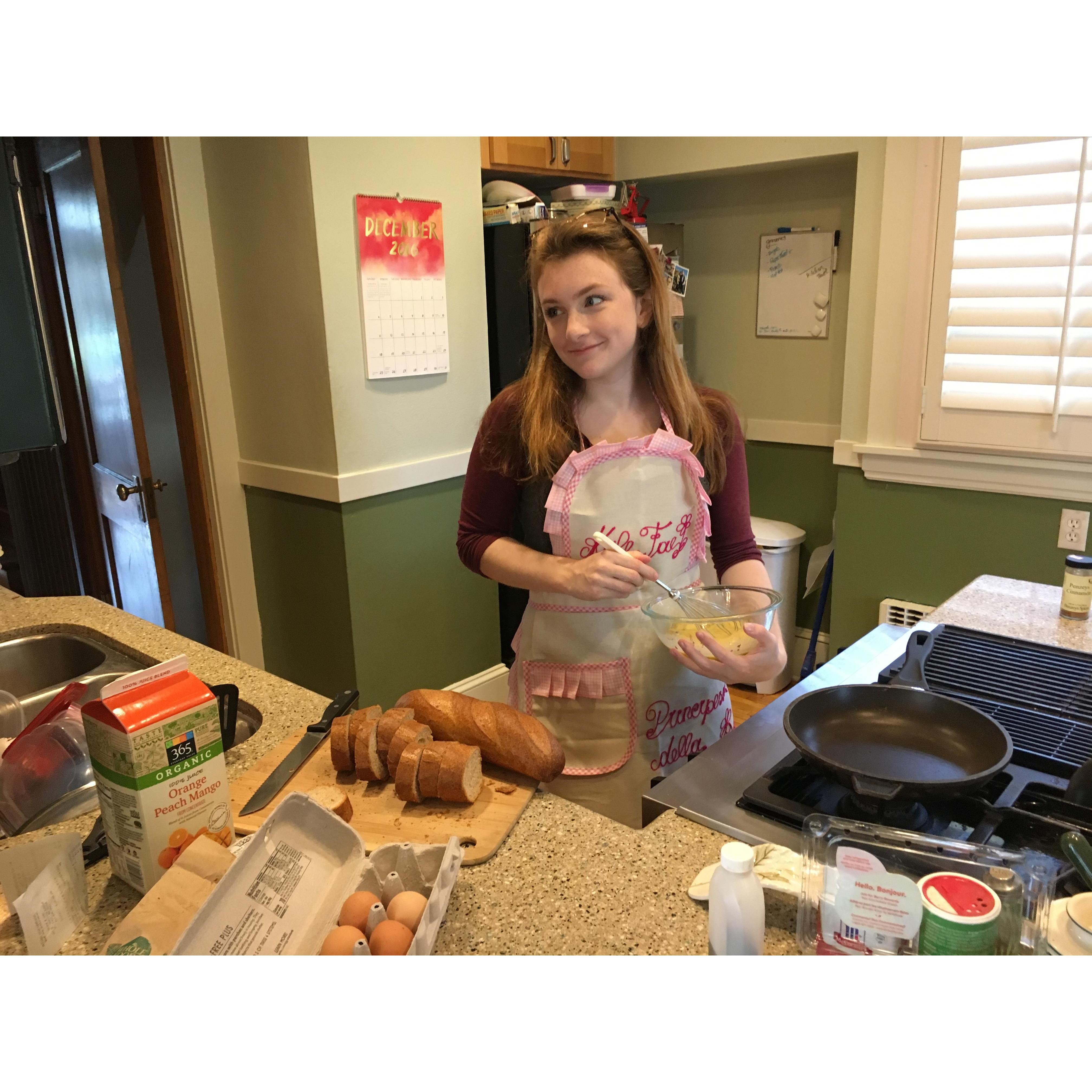 Kyle in her happy place, cooking up something delicious in the kitchen! :)