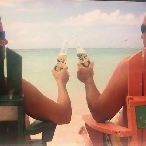 Our first vacation together, cruising the British Virgin Islands with family at the wheel.  Cheers