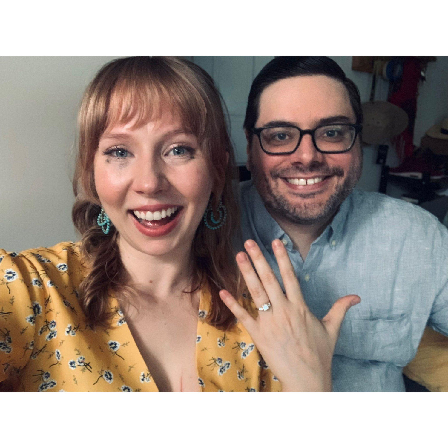 Engaged in our cozy Park Slope apartment in July 2022
