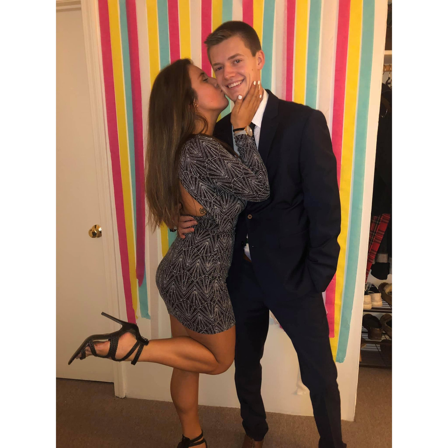 A winter formal where Brett surprised Lizzy and wore a santa tie to be festive