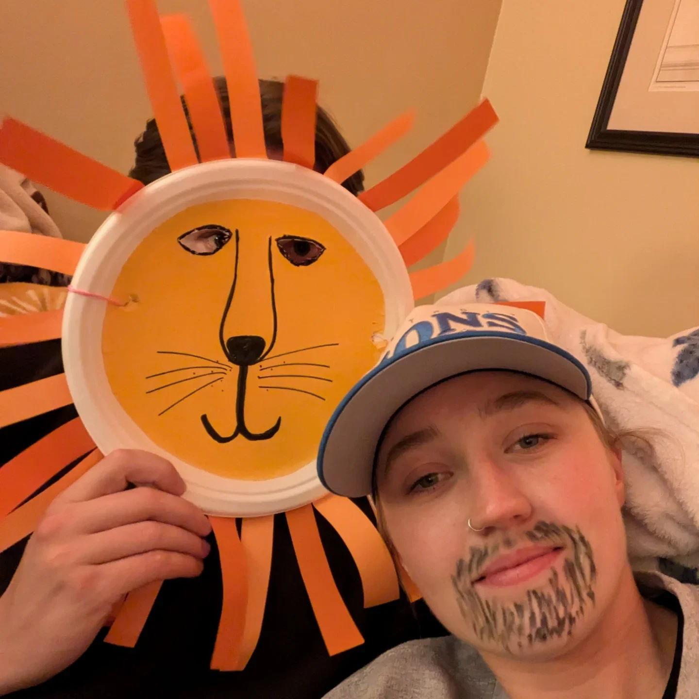 Our best couple costume--Dan Campbell and a Lion.