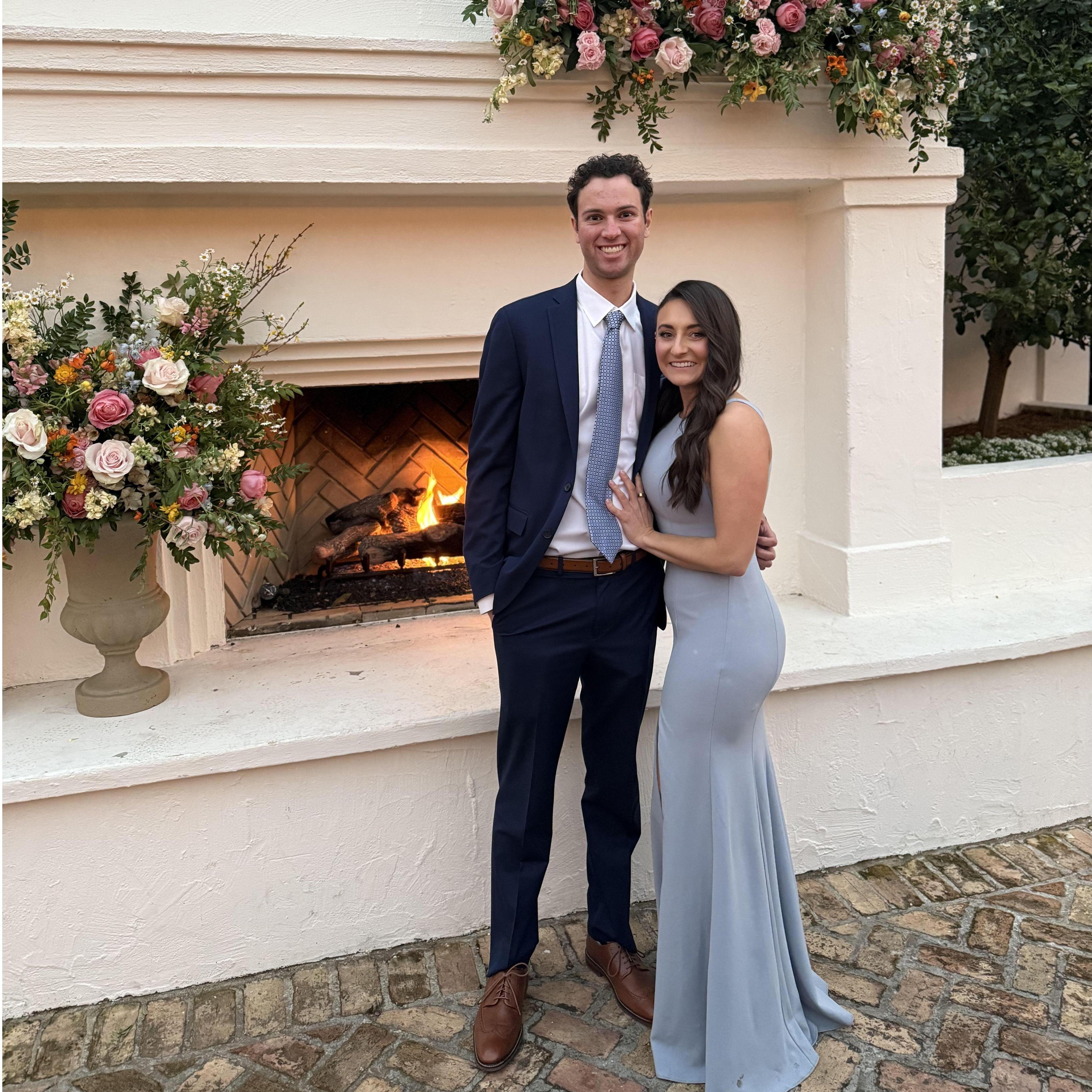 First wedding together! Natalie was the maid of honor and Michael supported her through the whole weekend. He even brought shoes for Natalie to change into after the Mass!