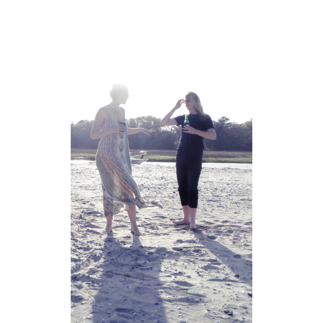 Playing bocce on No Name Beach with Olivia's dad back when Jon still wore skinny jeans