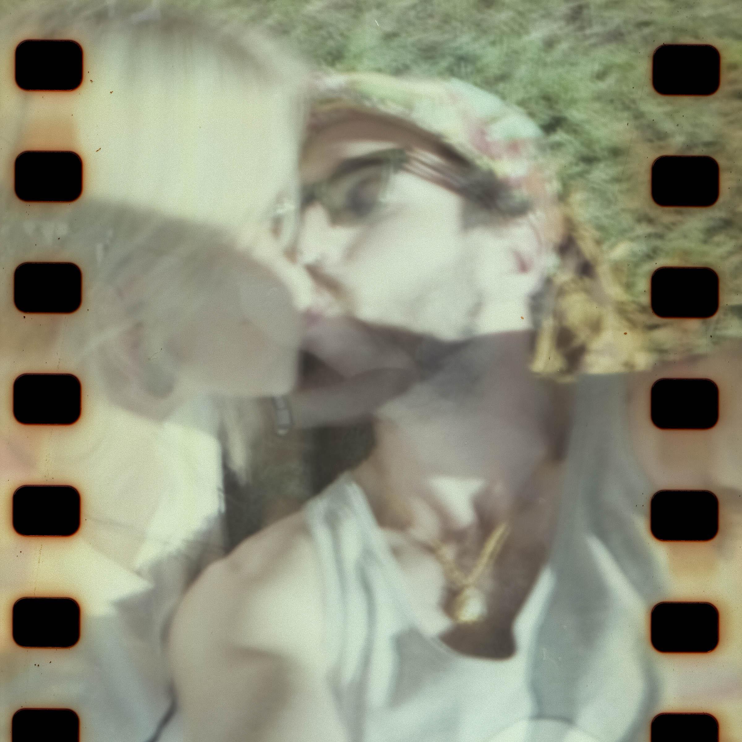 We fill each others' lives with the light of love and each other's cameras with the light of cheesy kissing