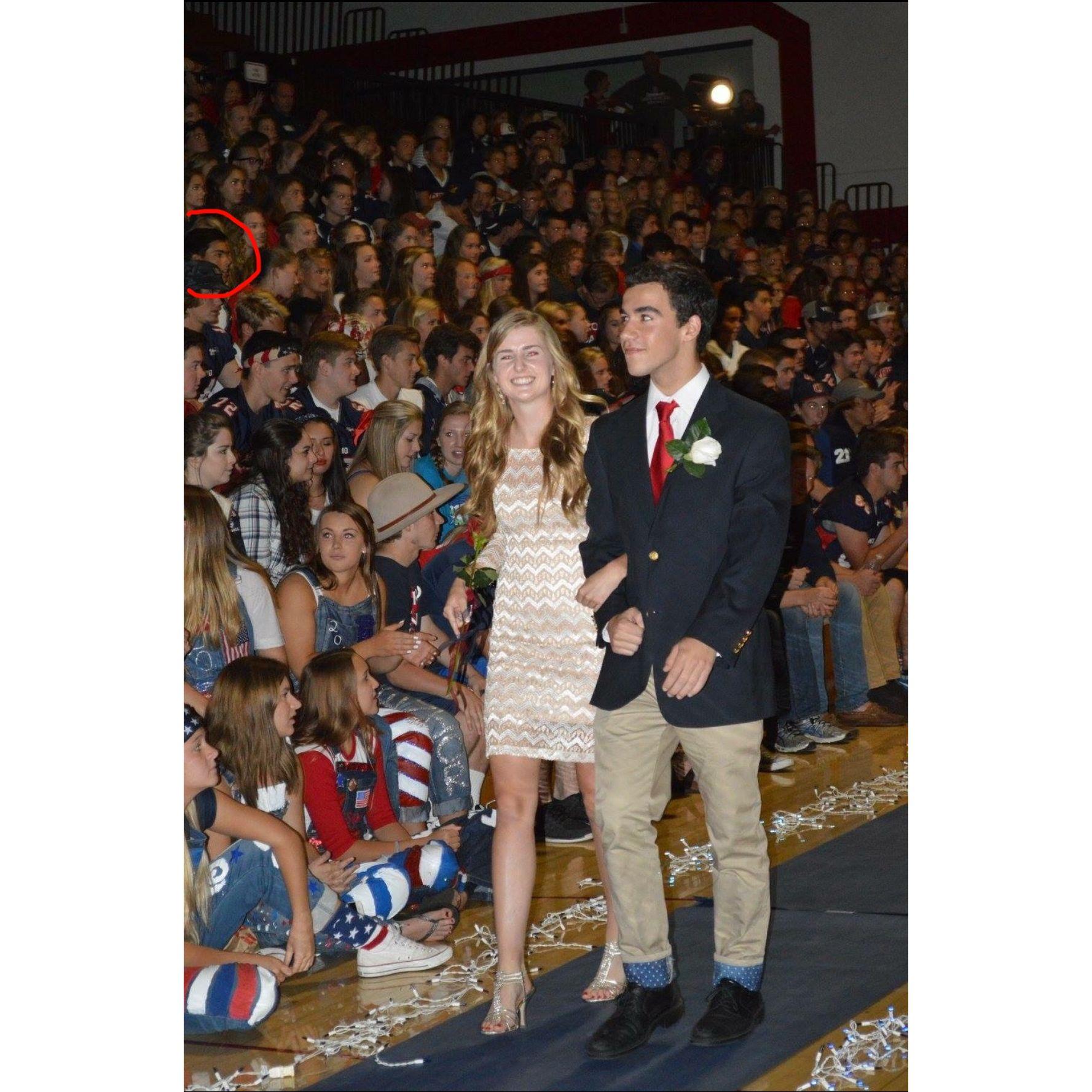 Our "first photo together" -- well more like Caleb in the background of the Homecoming Court photo. We never met in high school but God already had our story written.