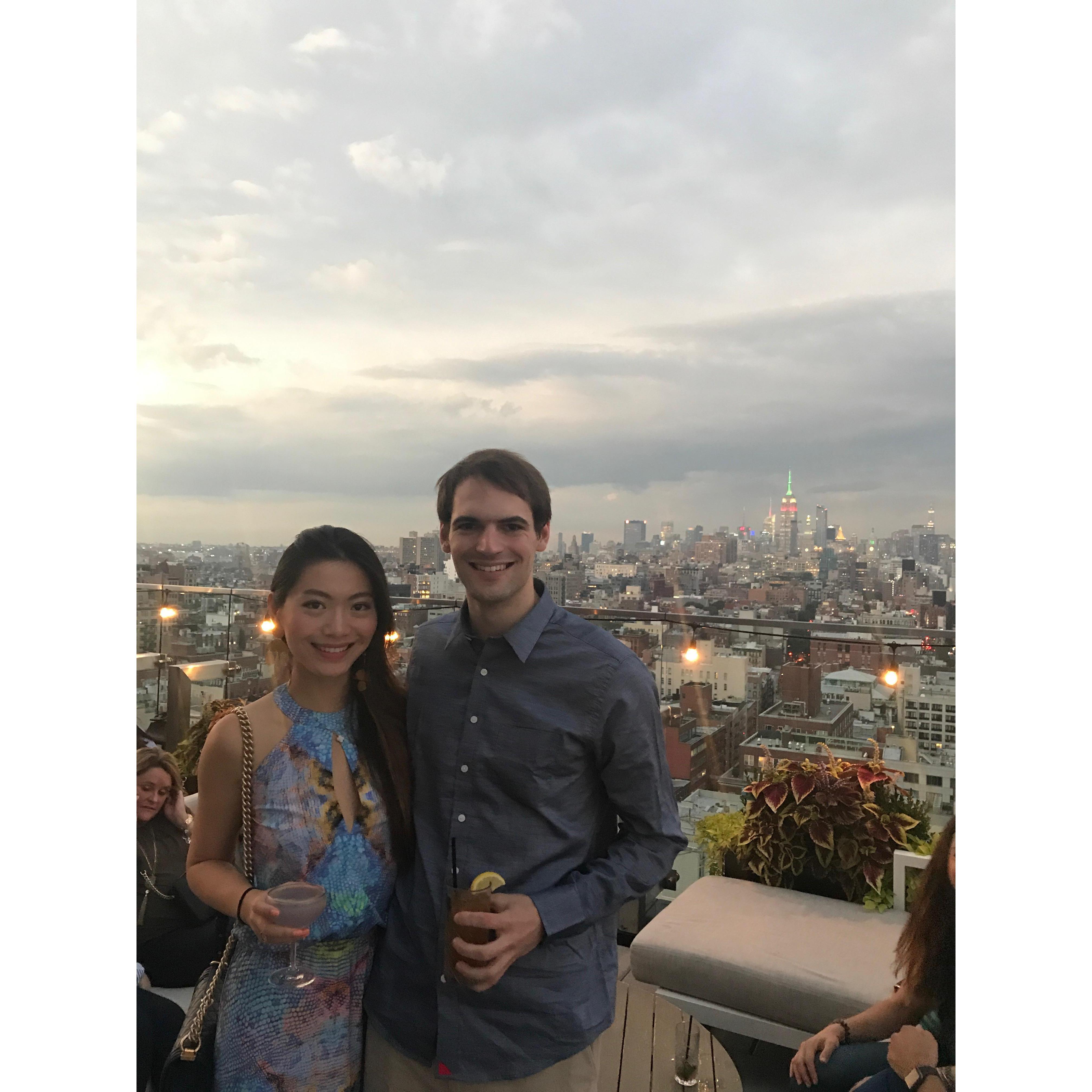 Celebrating Chang's birthday at a rooftop bar in New York