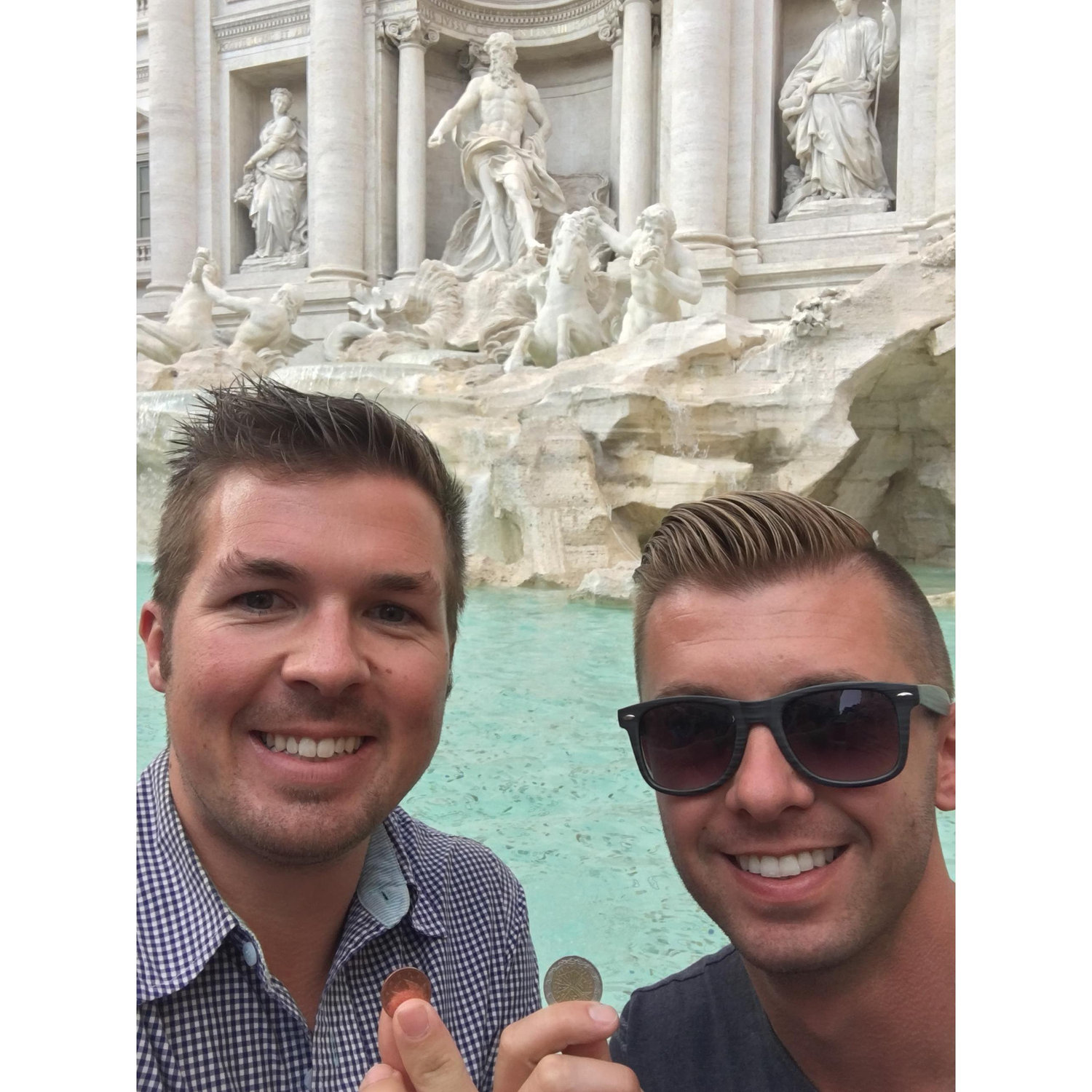 Making a wish at Trevi Fountain. Rome, Italy