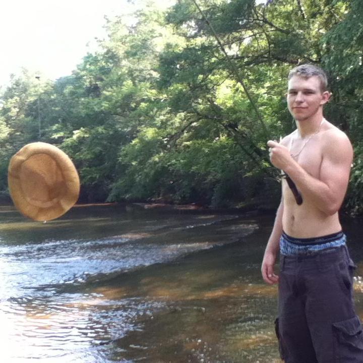 One of my all time favorite pictures! My hat fell in the river while we were fishing and he got it for me (the only thing he caught that day).