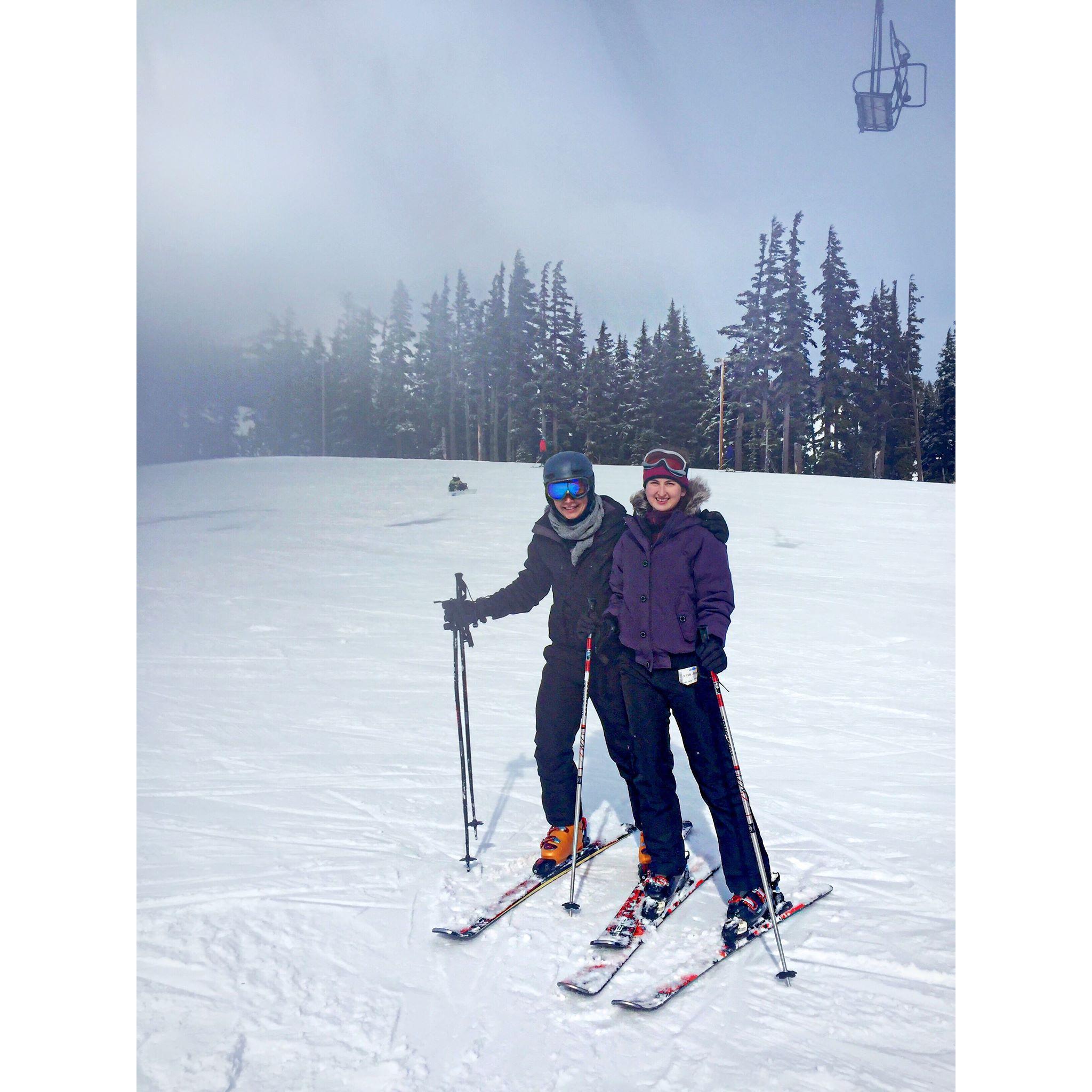 Nathan teaching Dom to skI!