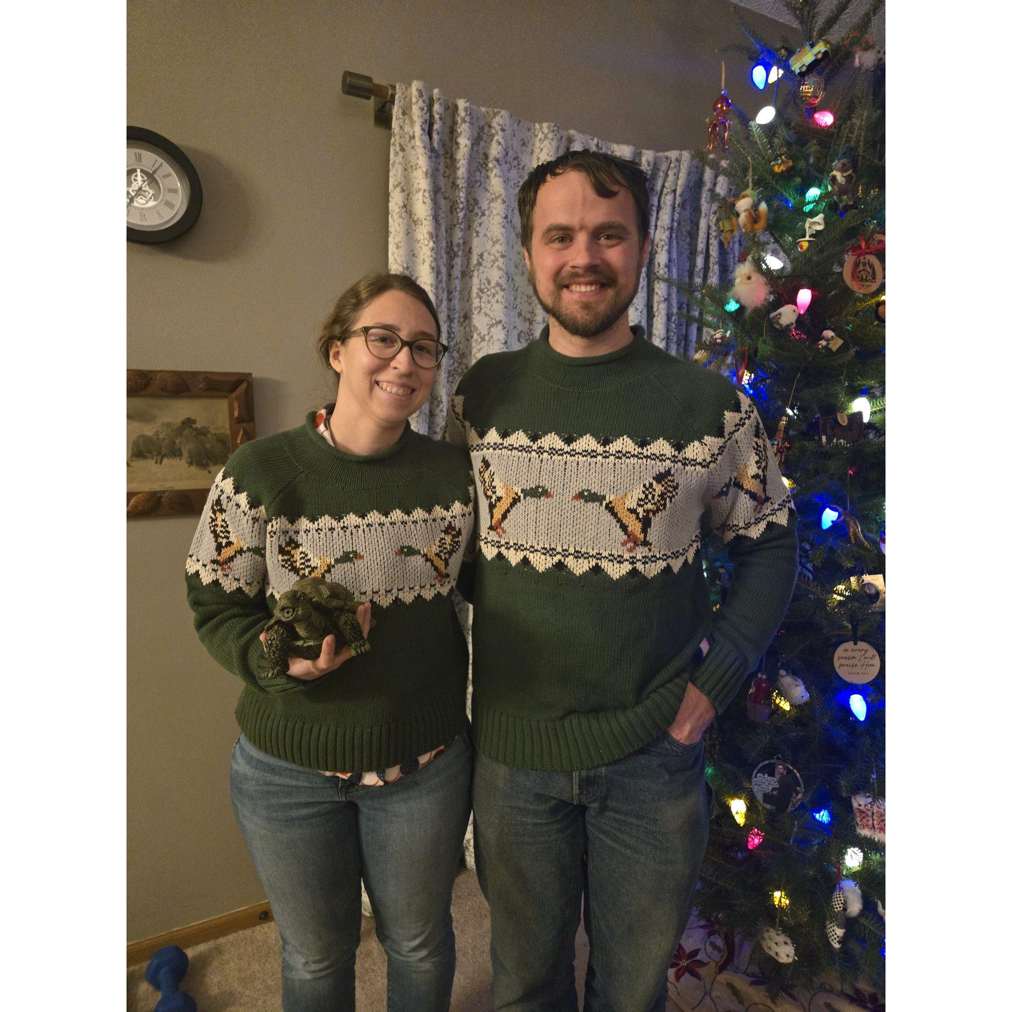Matching duck sweaters. #iykyk