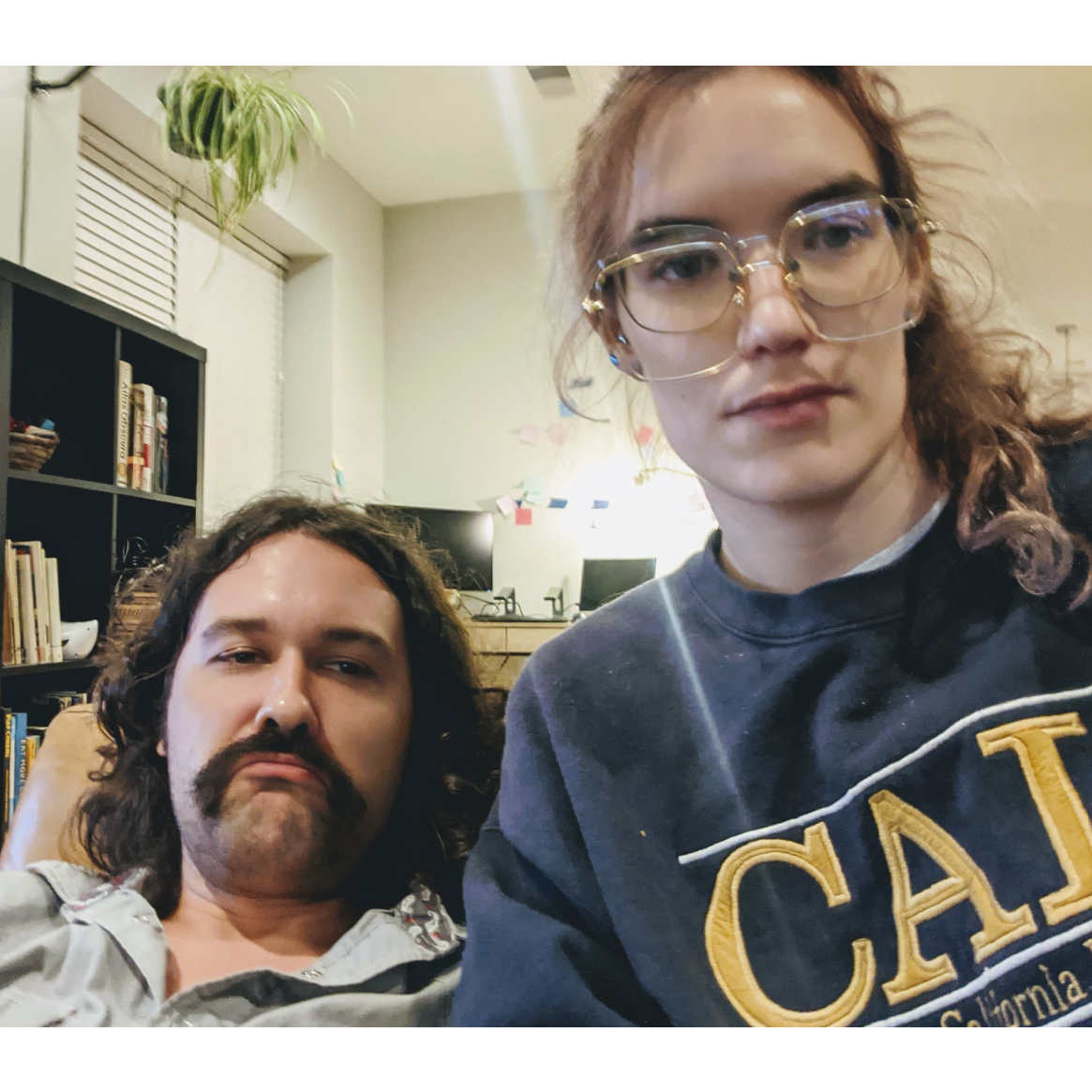 still cooped up in a basement, 2020. But Ben had a mustache and Arienne had two pairs of glasses which was something