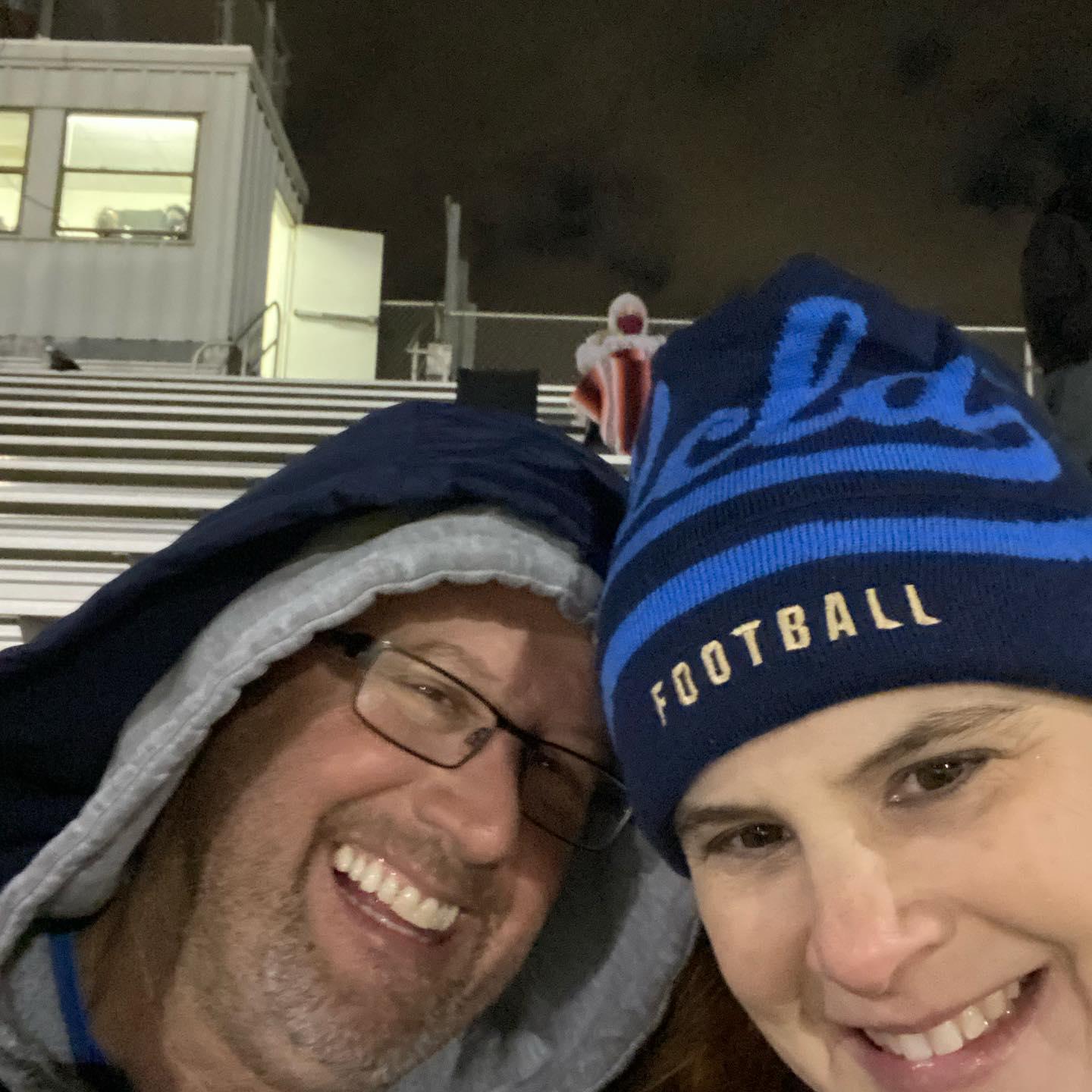 Bundled up at a cold High School Football game
