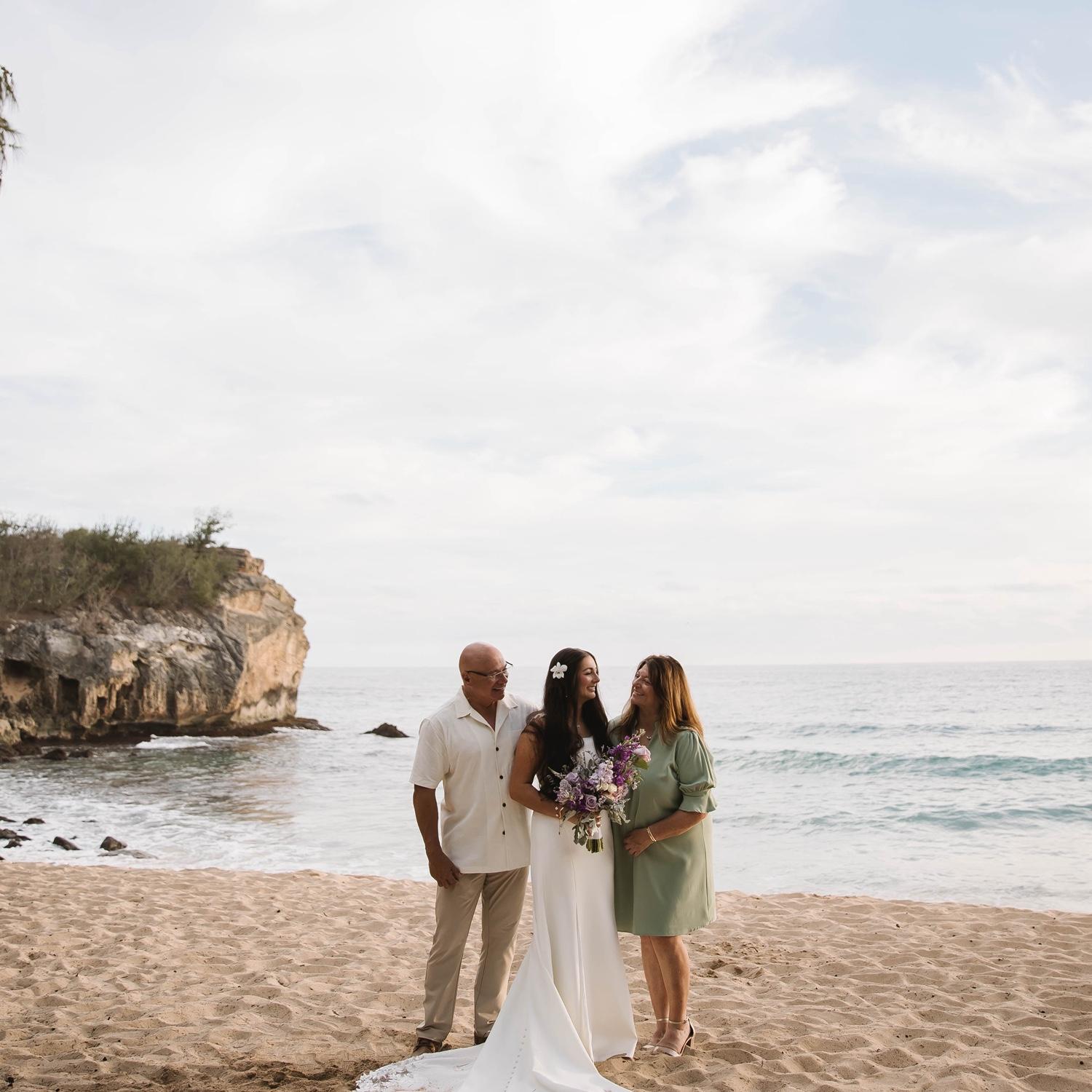 Cassie with her parents Raul and Mary.