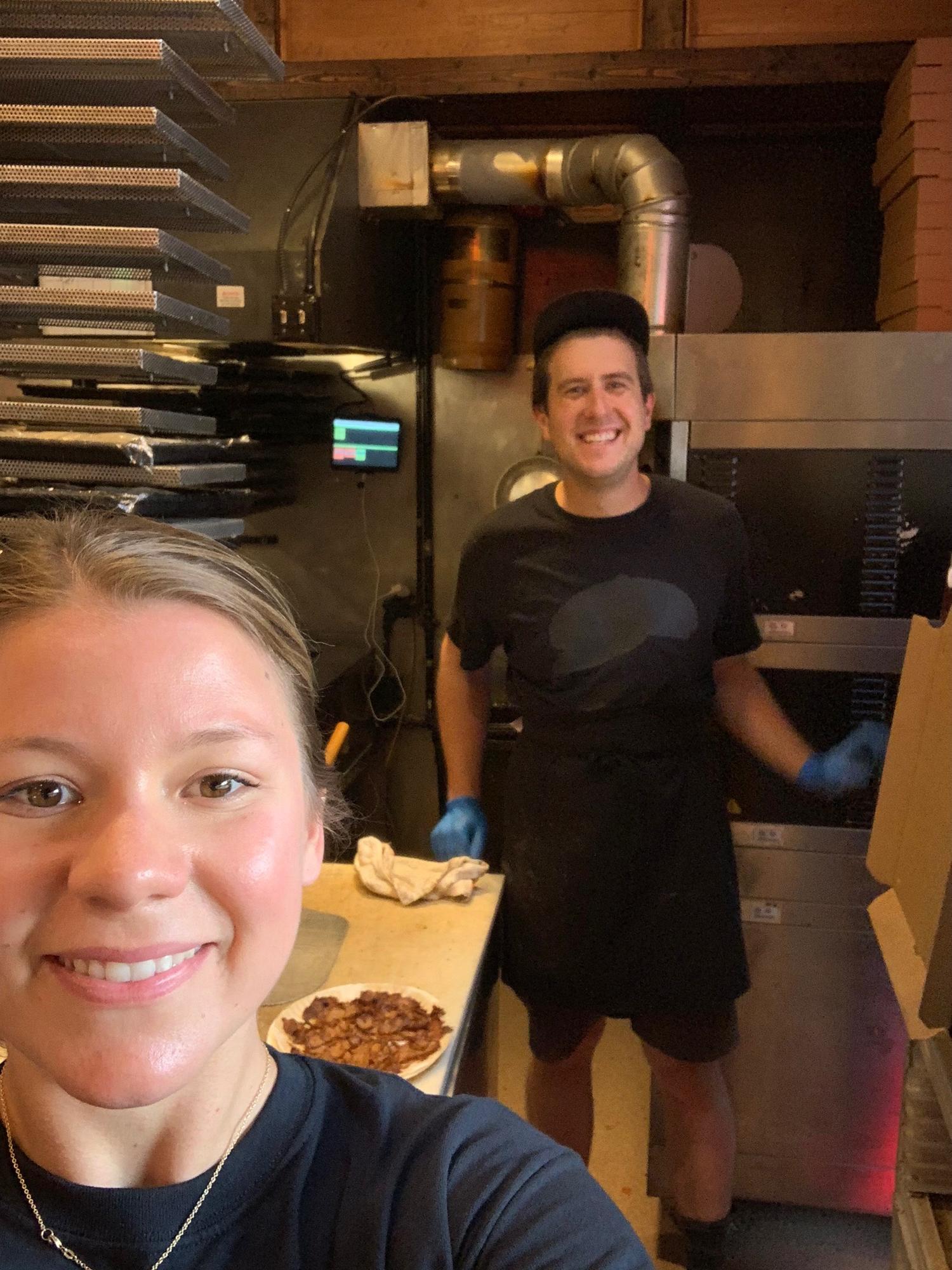 In the place where it all began...Lauren helping Ben in the kitchen at his restaurant.