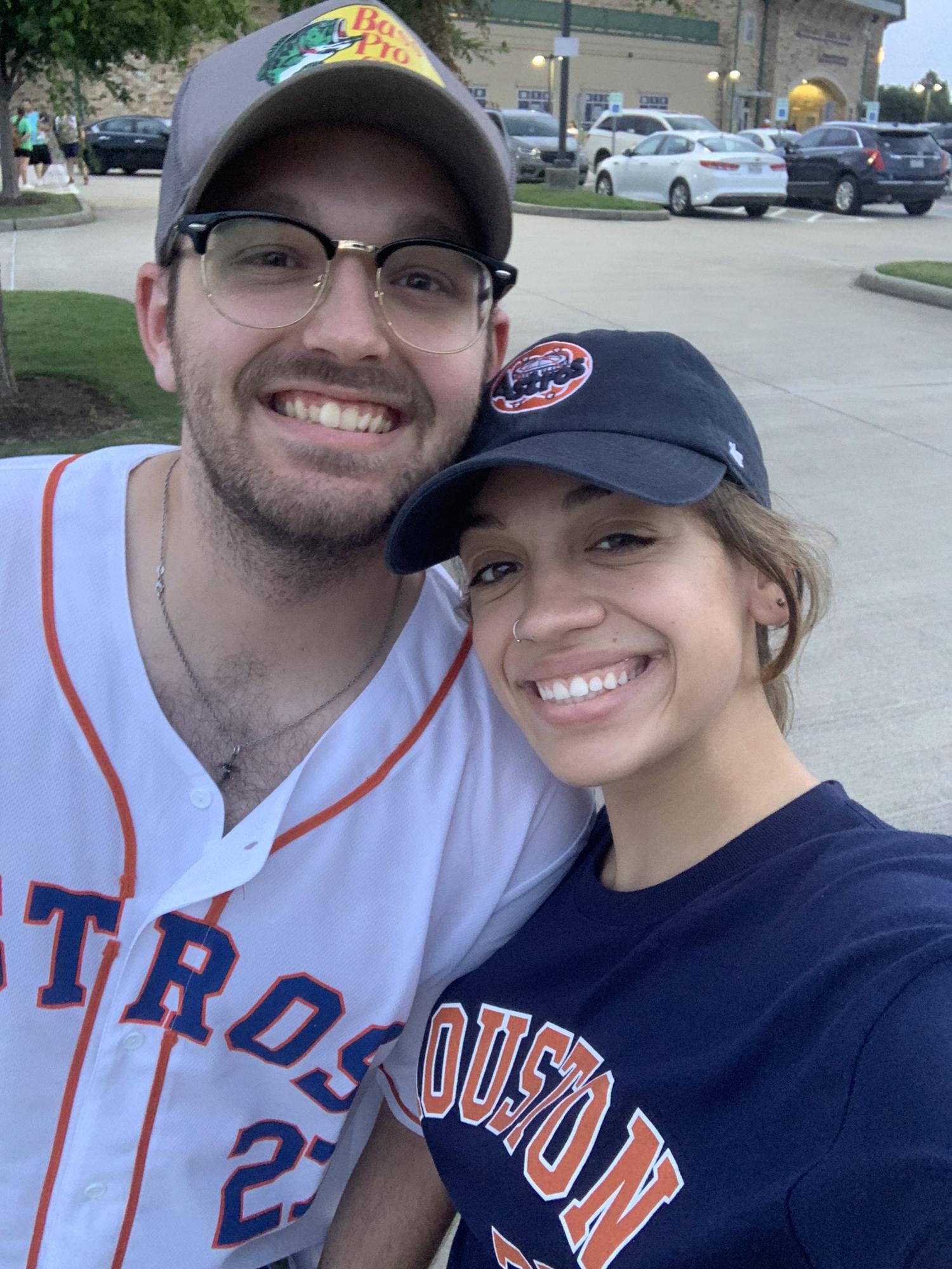 he loves baseball! she loves that he loves watching baseball!