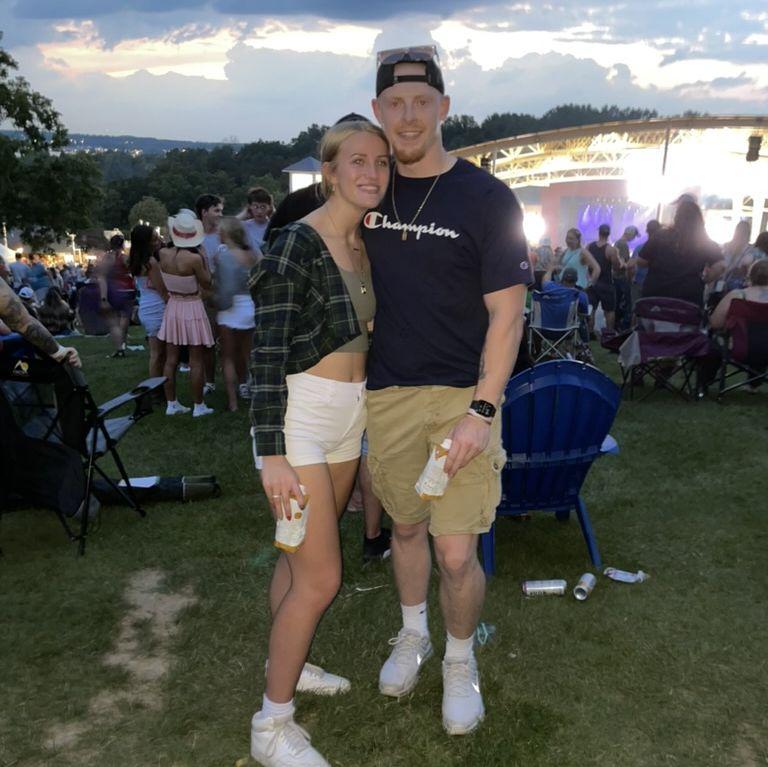 Our first real photo together at a Luke Combs concert at CMAC :)